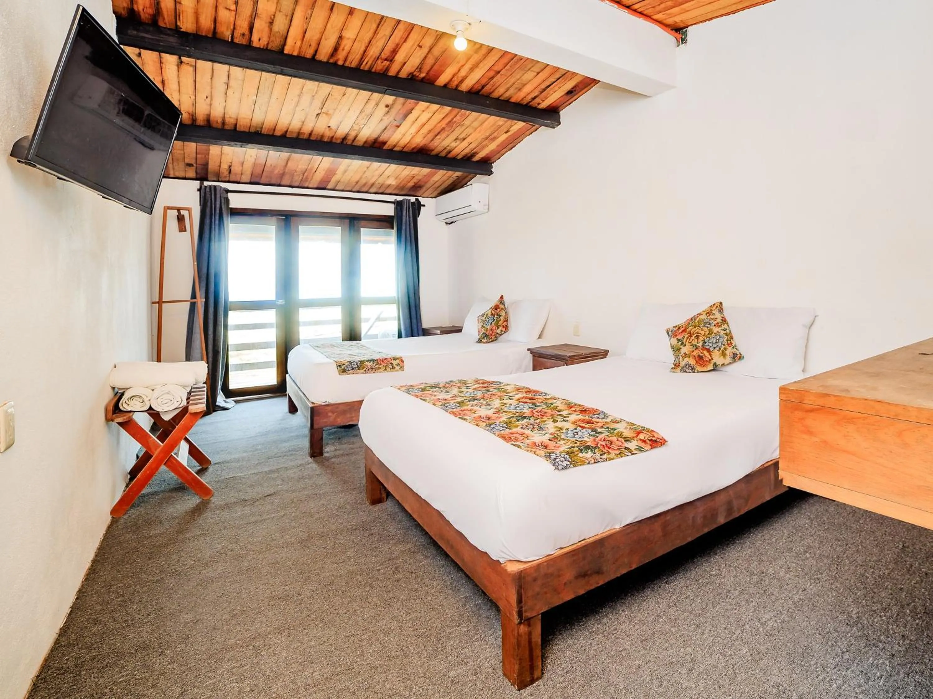 Bedroom in Capital O Verdemar, Pie de la Cuesta