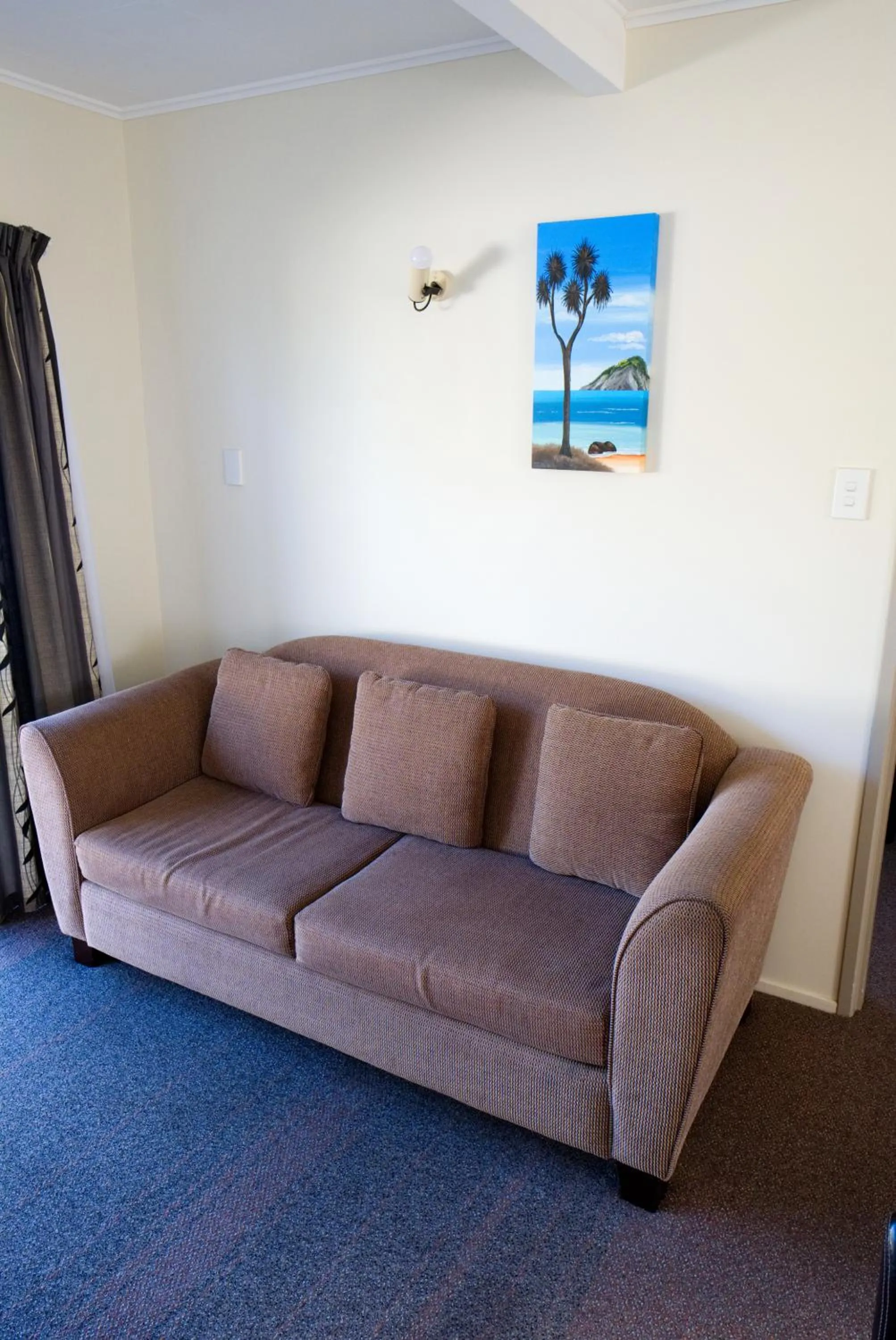 Bed in Tairua Shores Motel