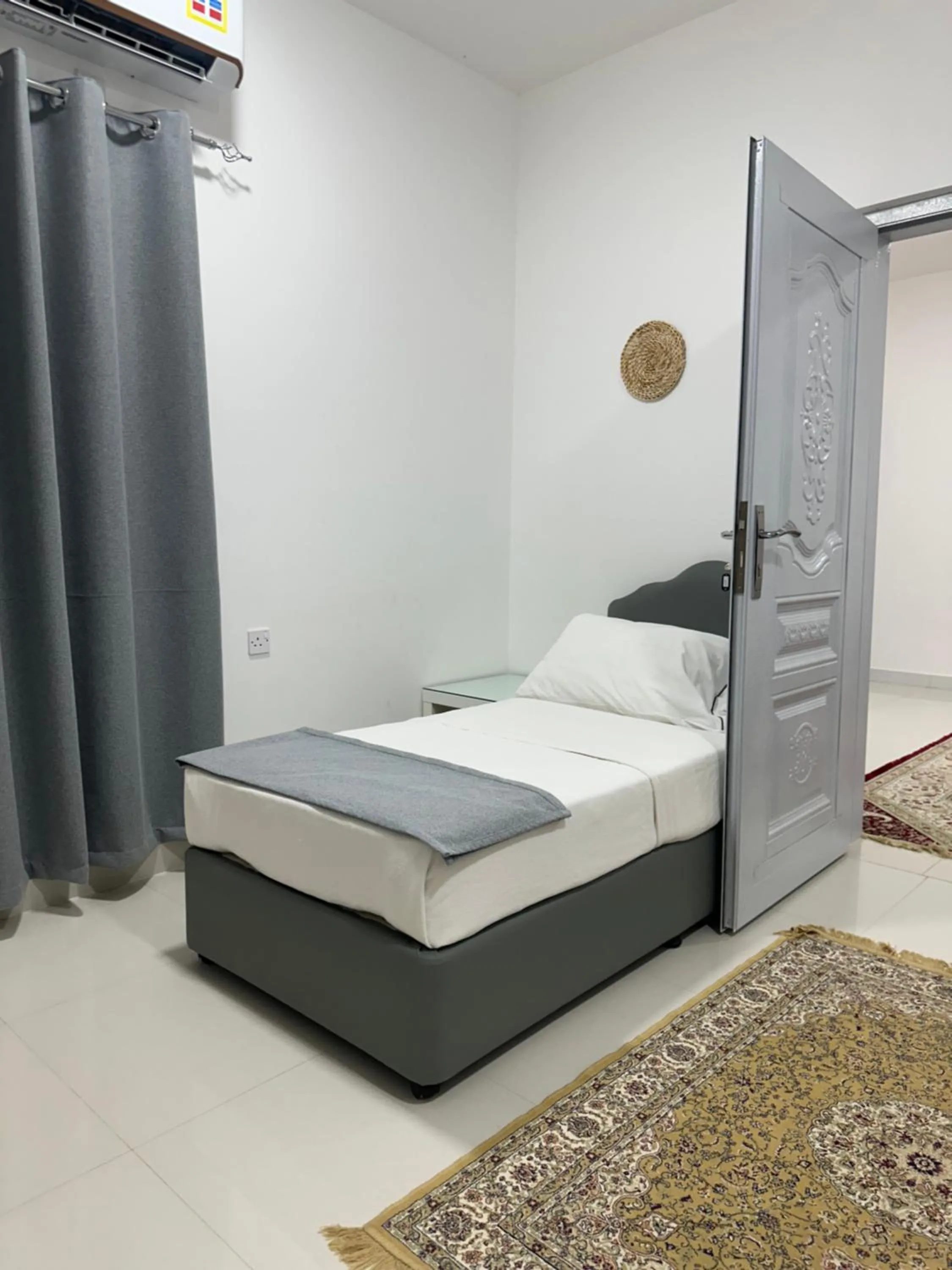 Bed in Oriental Nights Rest House