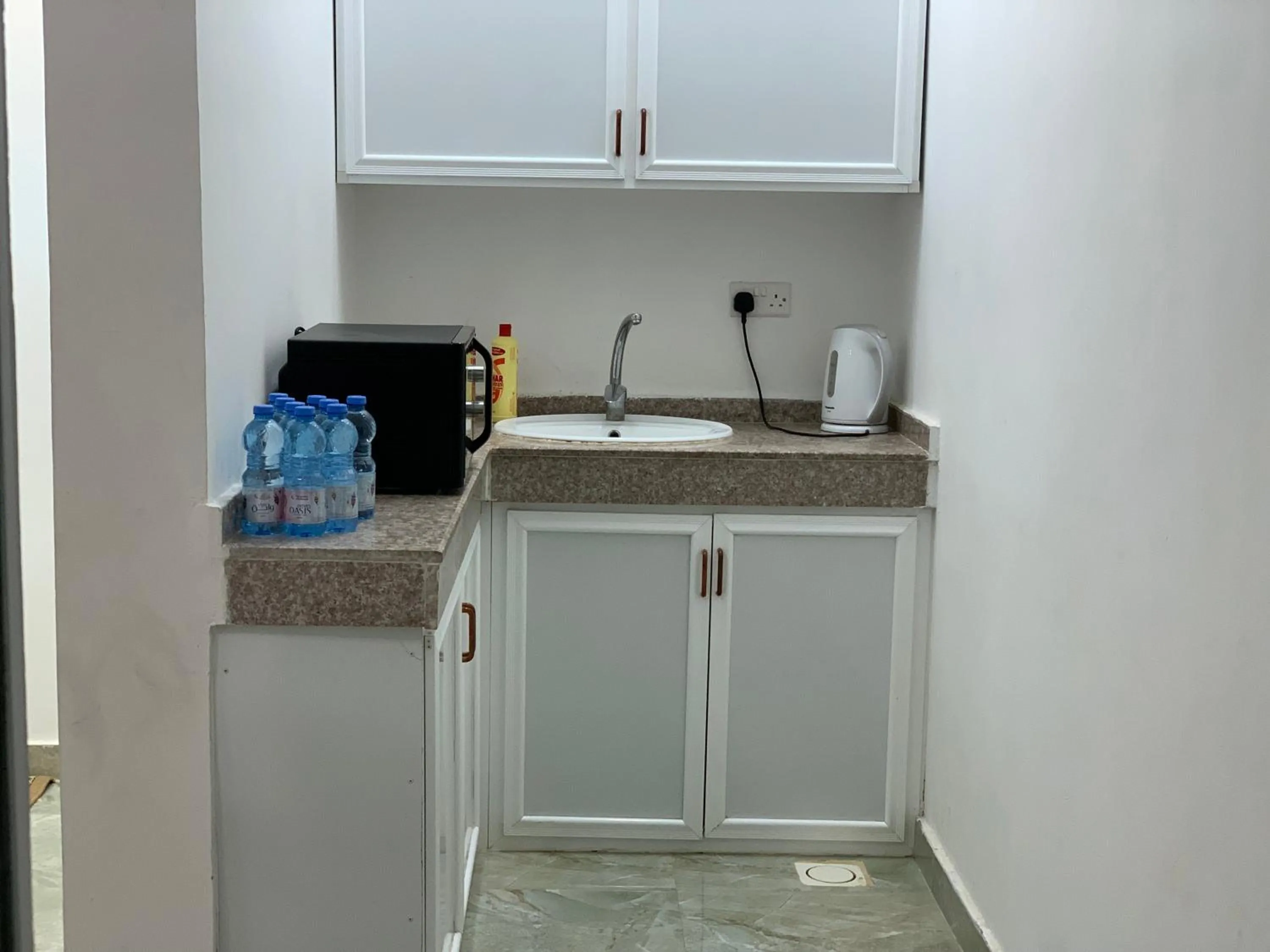 Kitchen or kitchenette in Oriental Nights Rest House