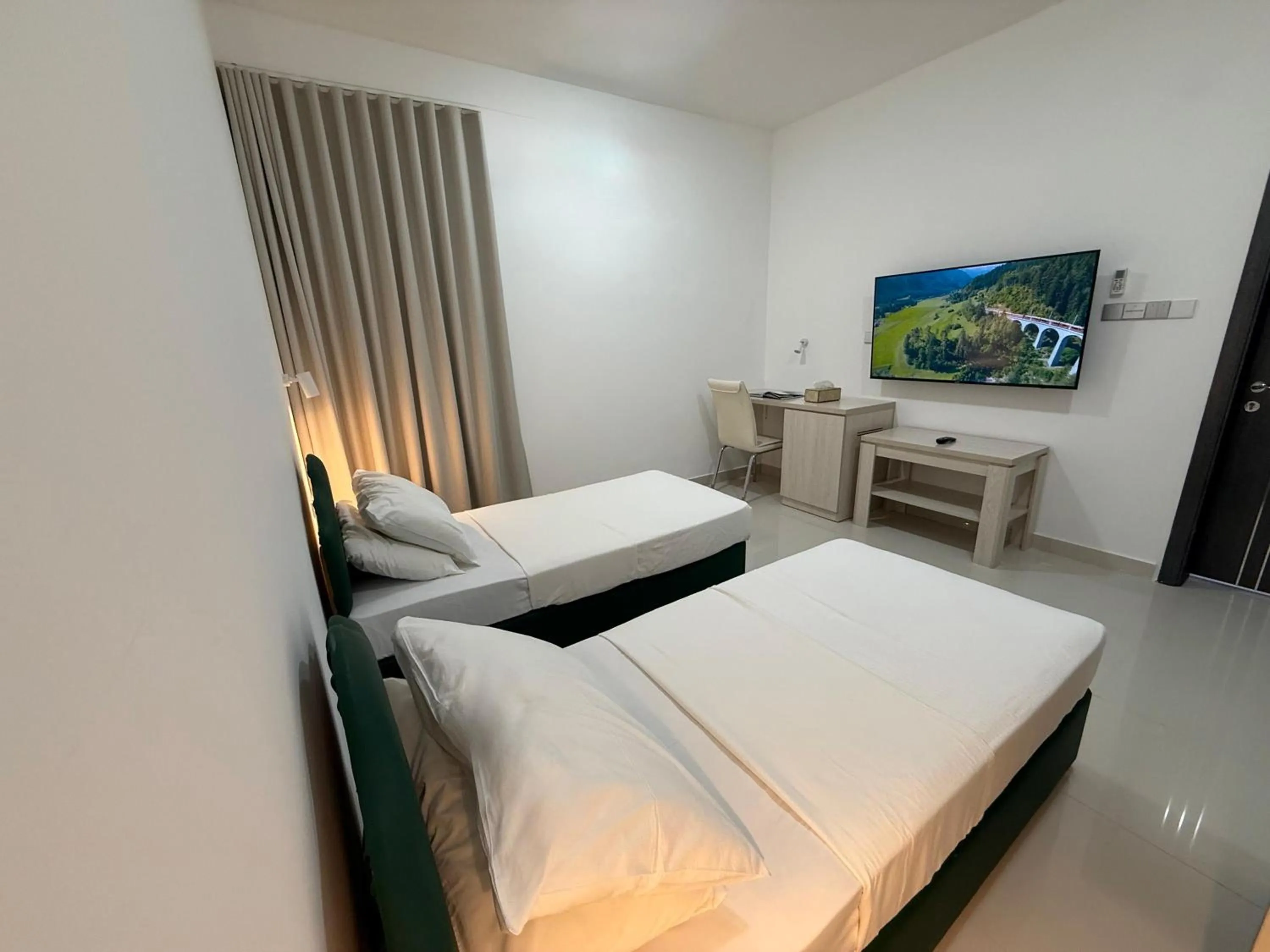 Bed in Oriental Nights Rest House