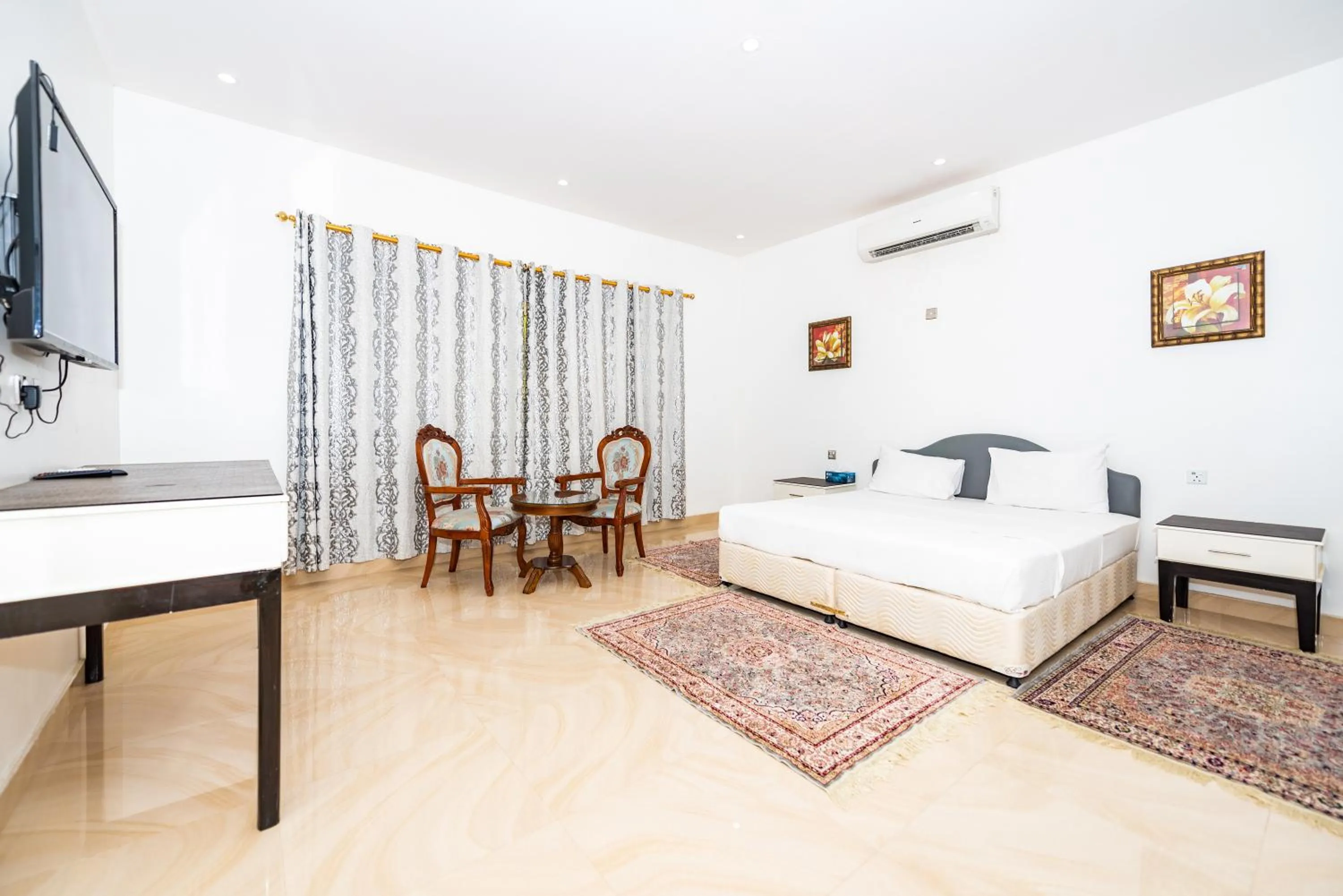 Photo of the whole room, Bed in Oriental Nights Rest House