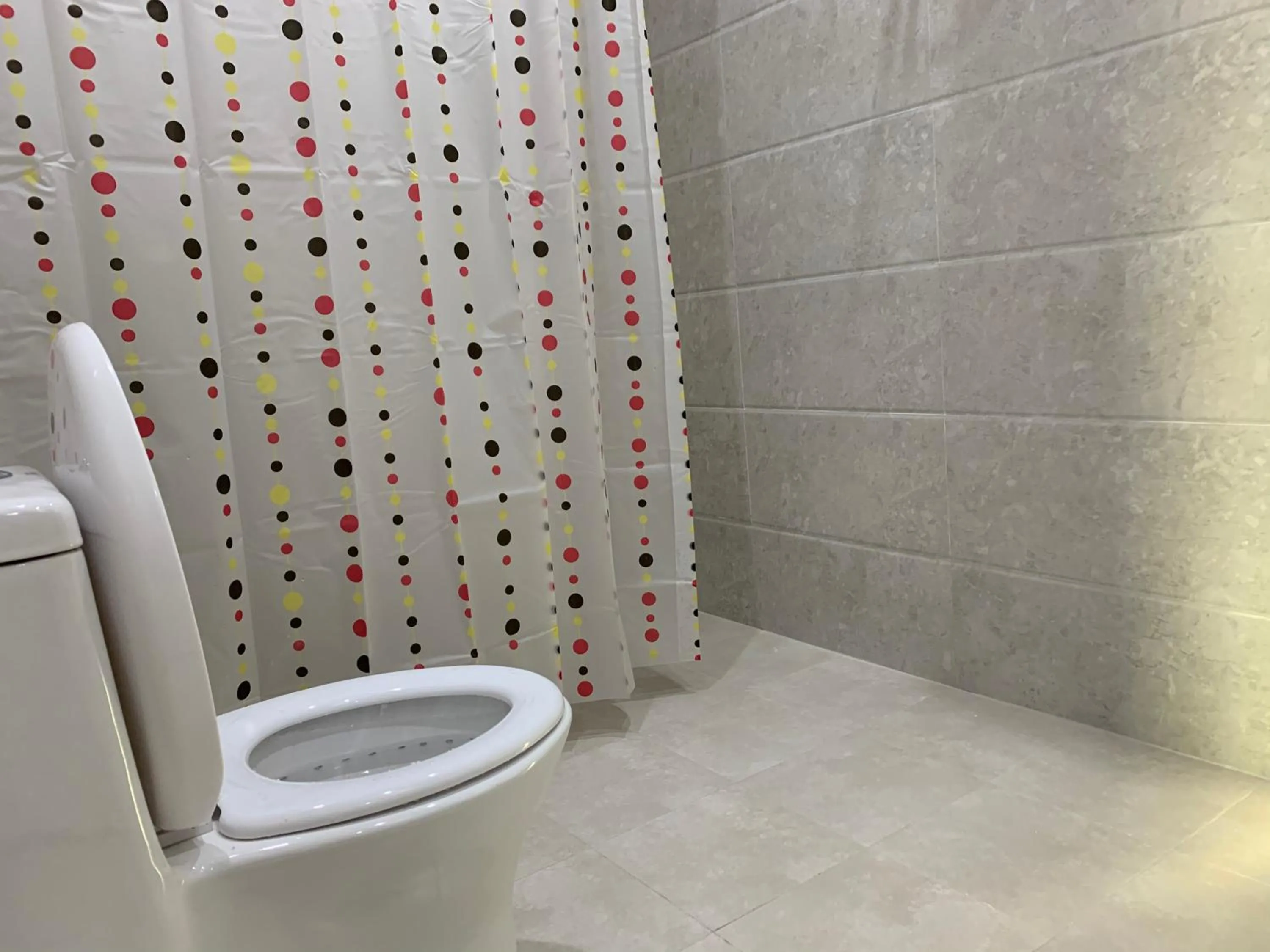 Toilet in Oriental Nights Rest House