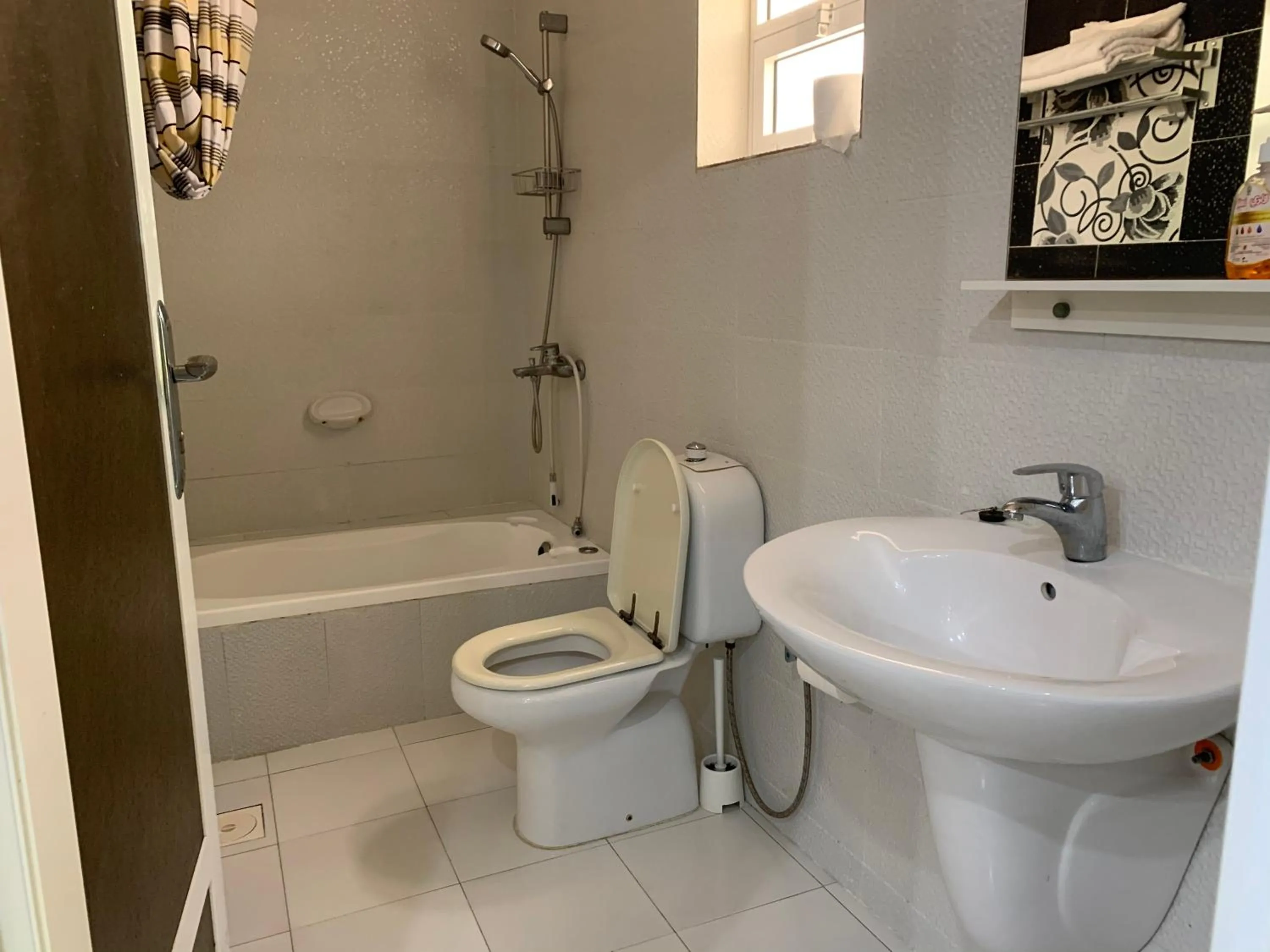 Toilet in Oriental Nights Rest House