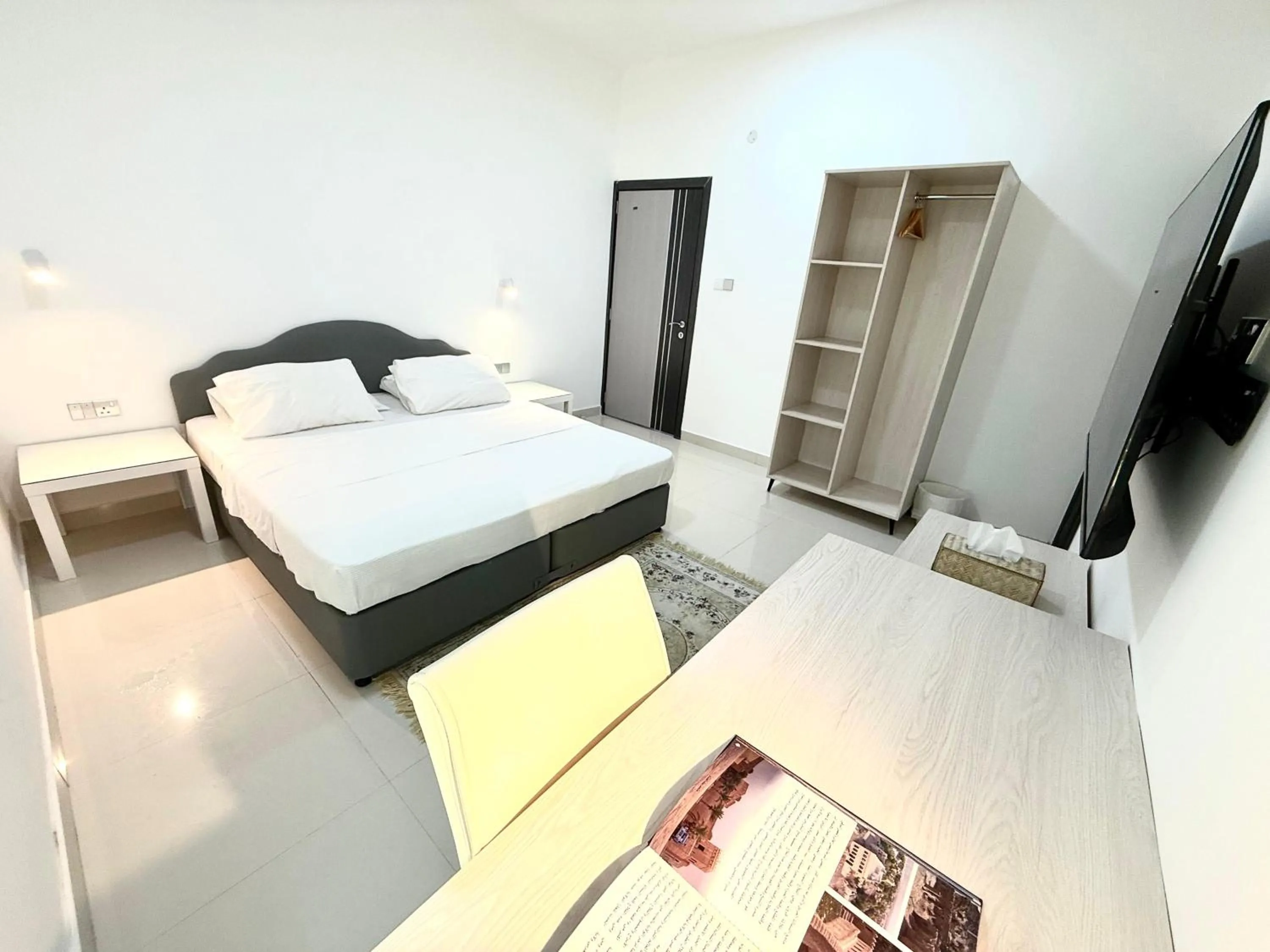 Bed in Oriental Nights Rest House