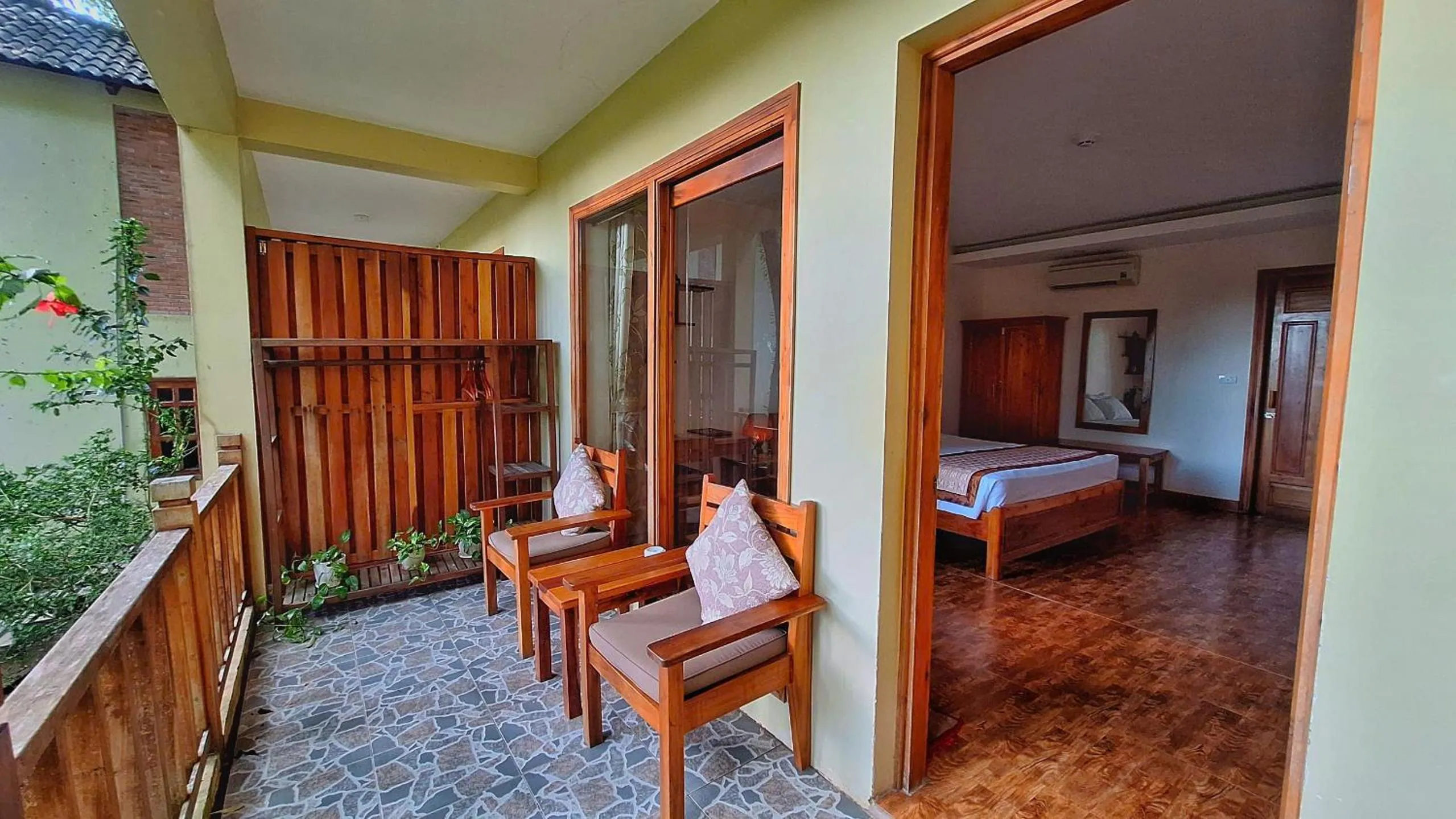 Patio, Bed in Ancarine Beach Resort