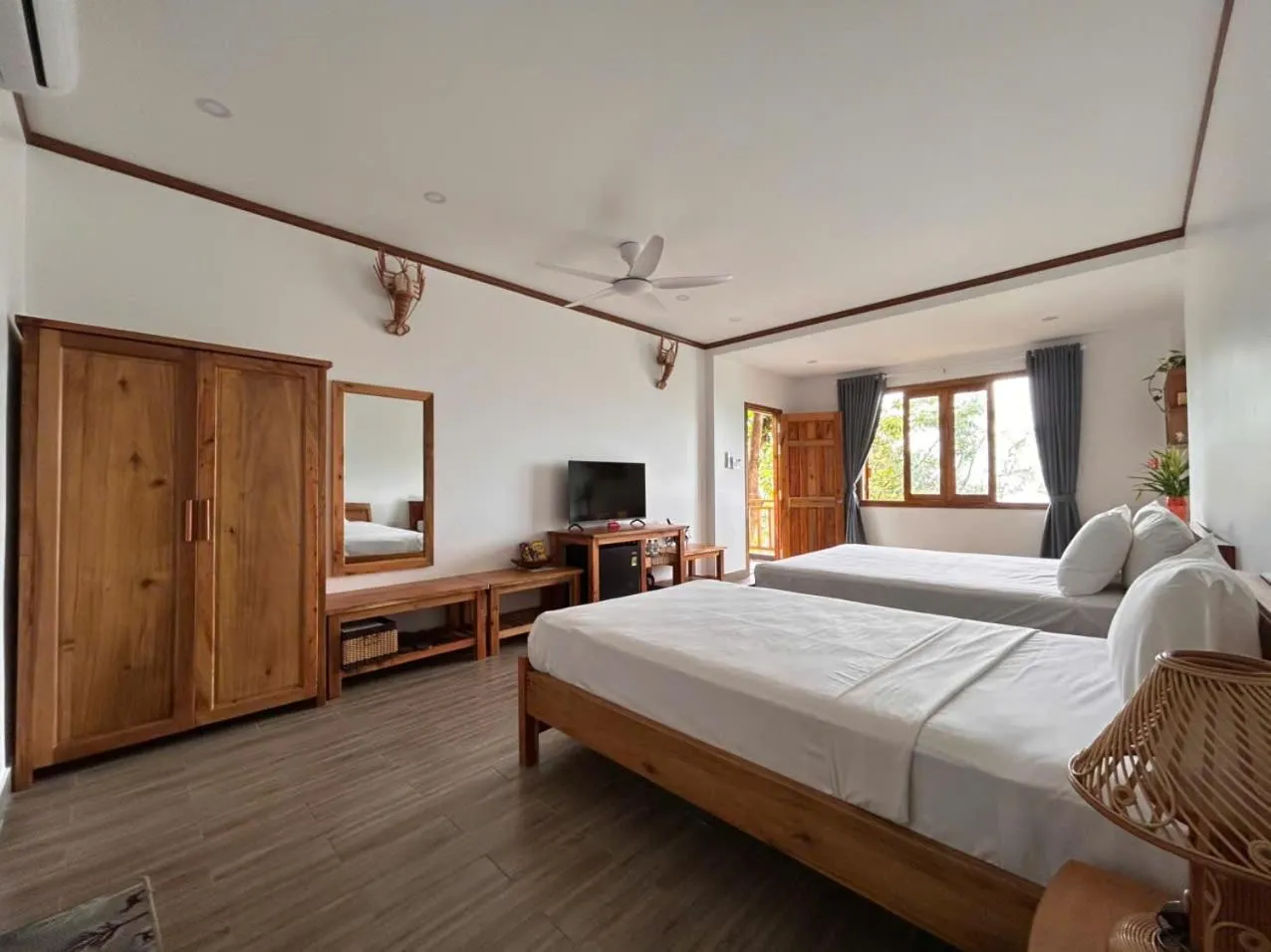 Bed in Ancarine Beach Resort