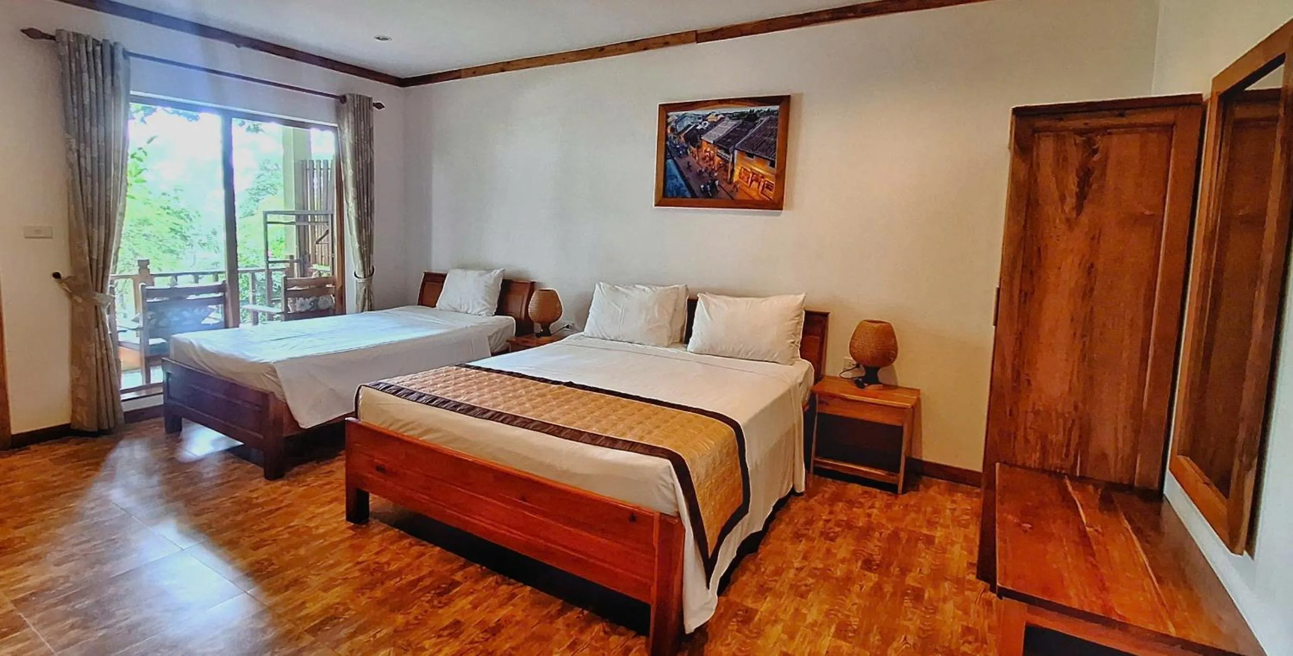 Bed in Ancarine Beach Resort