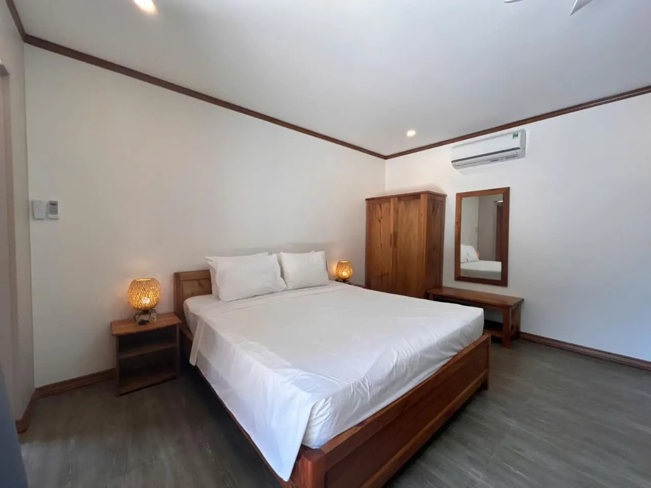 Bed in Ancarine Beach Resort