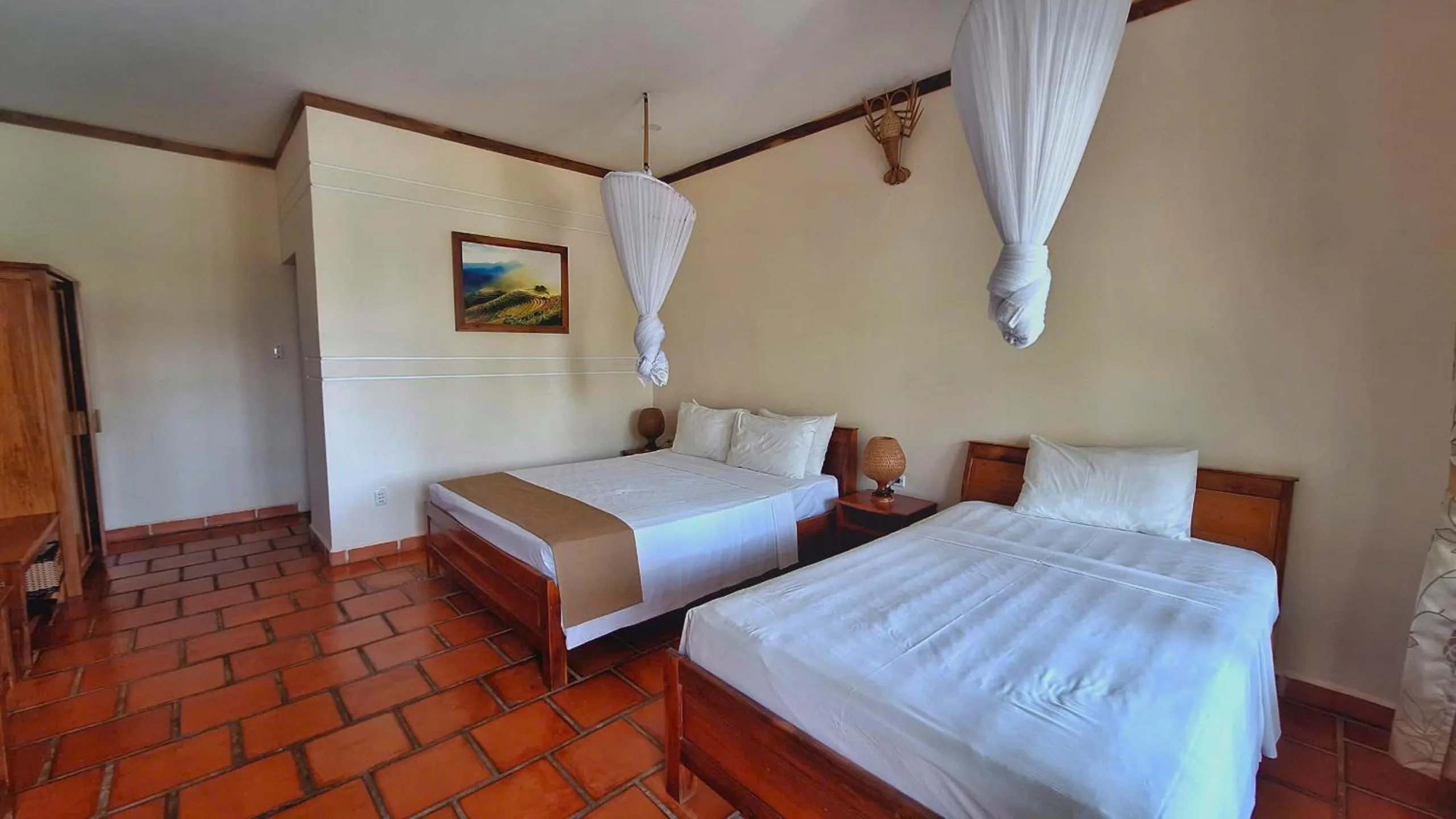 Bed in Ancarine Beach Resort