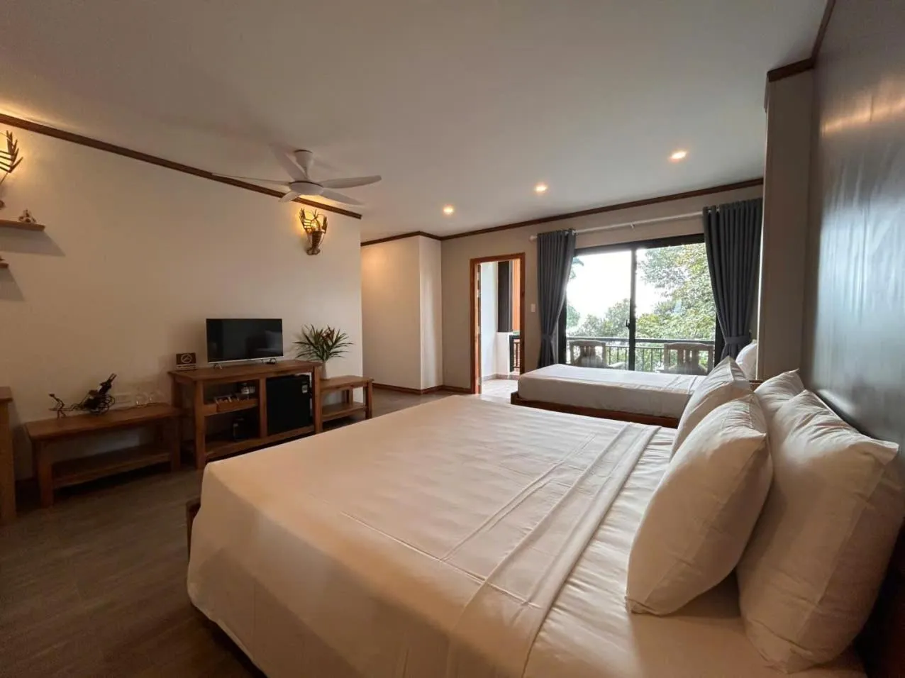 Bed in Ancarine Beach Resort