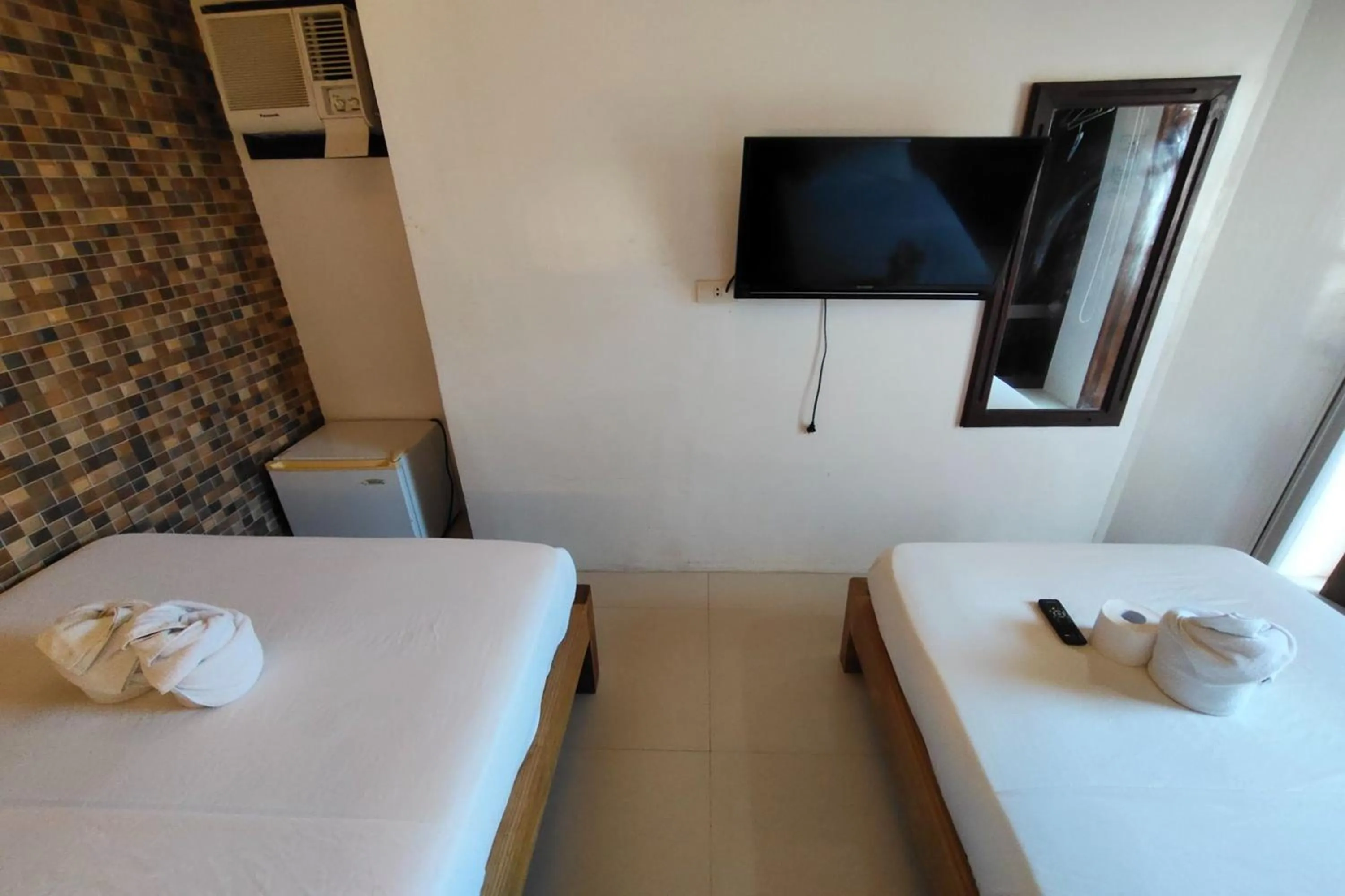 Bed in Taj Guesthouse Boracay