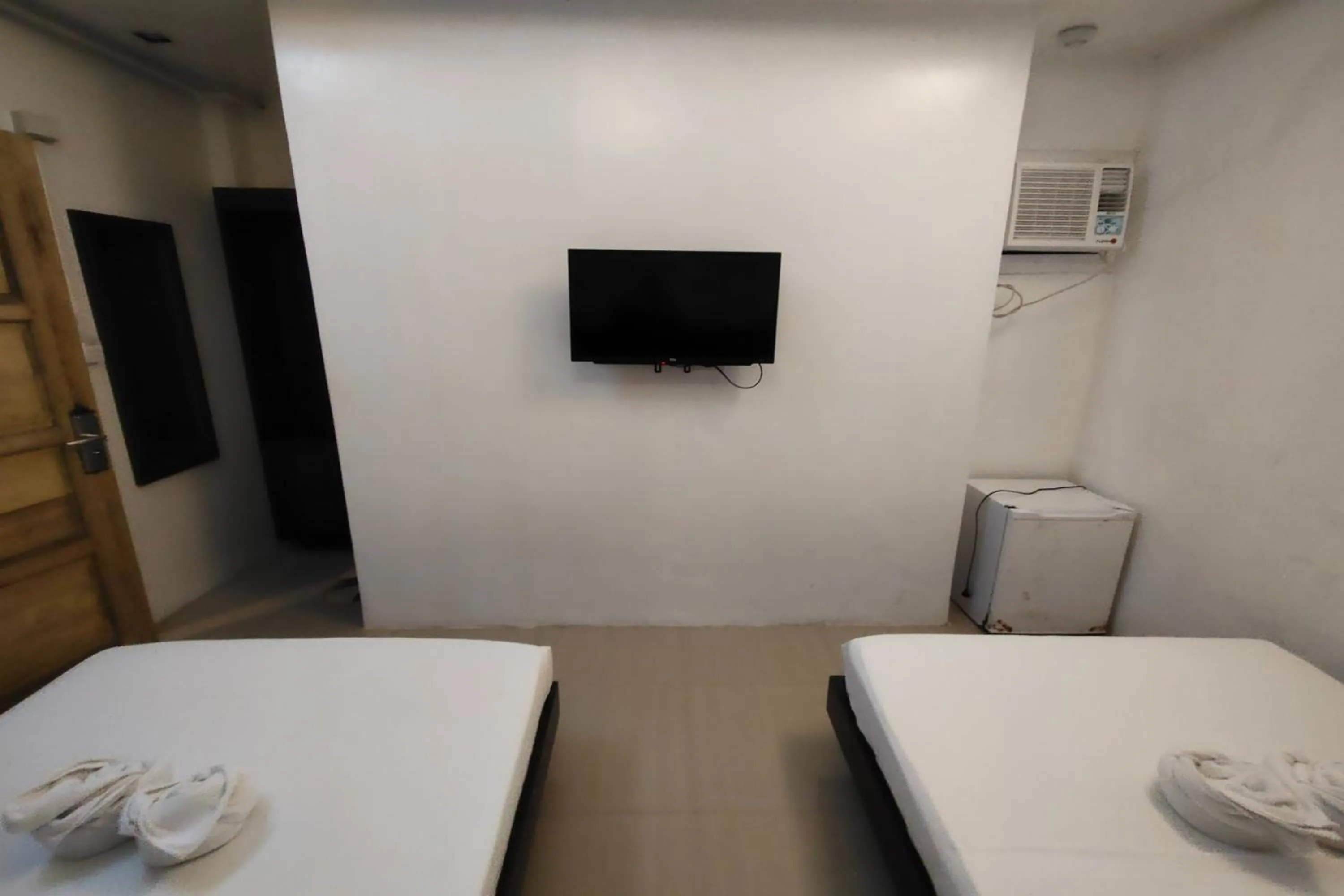 Bed in Taj Guesthouse Boracay