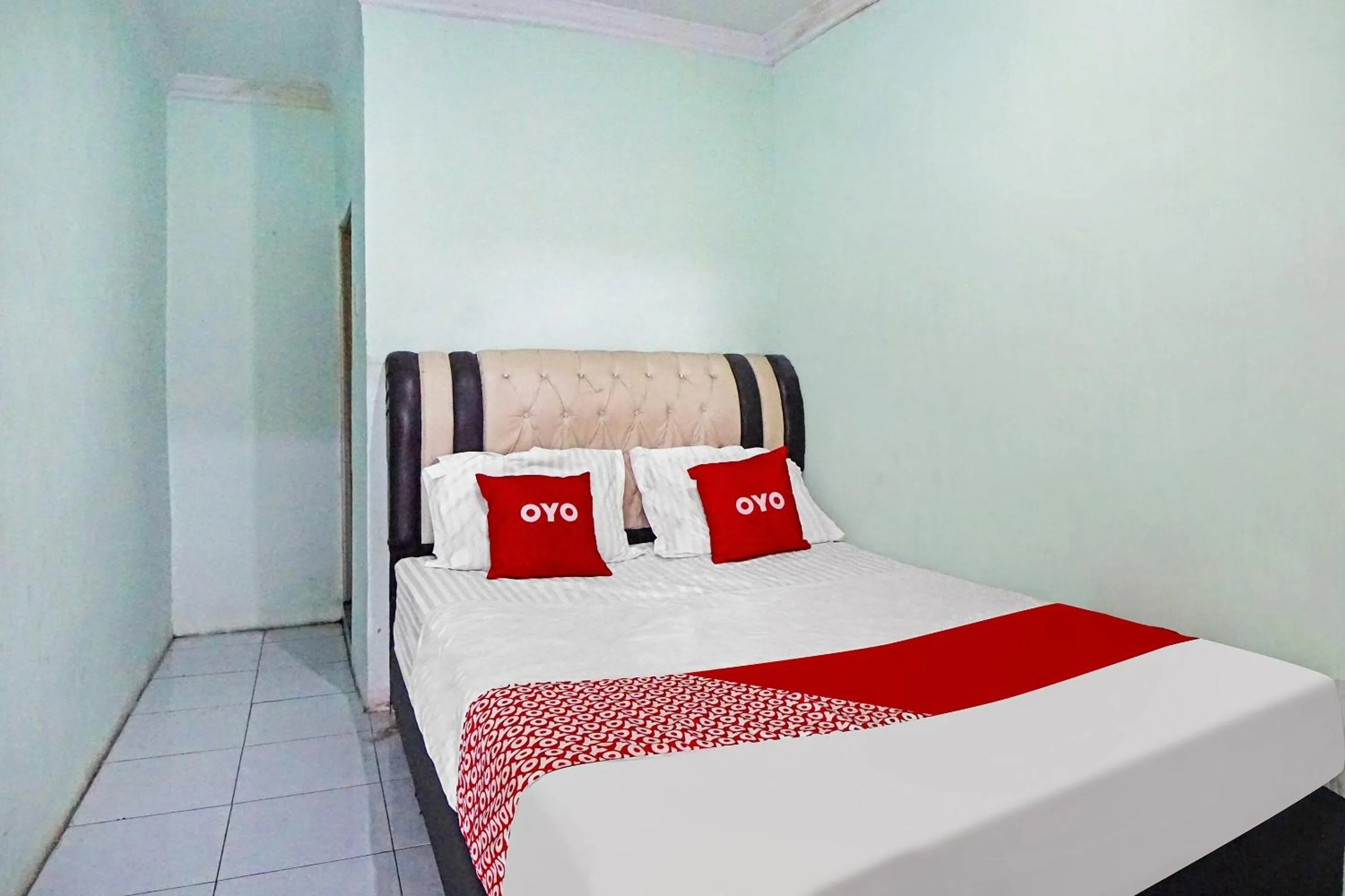 Bedroom in Hotel O Puri Dennis