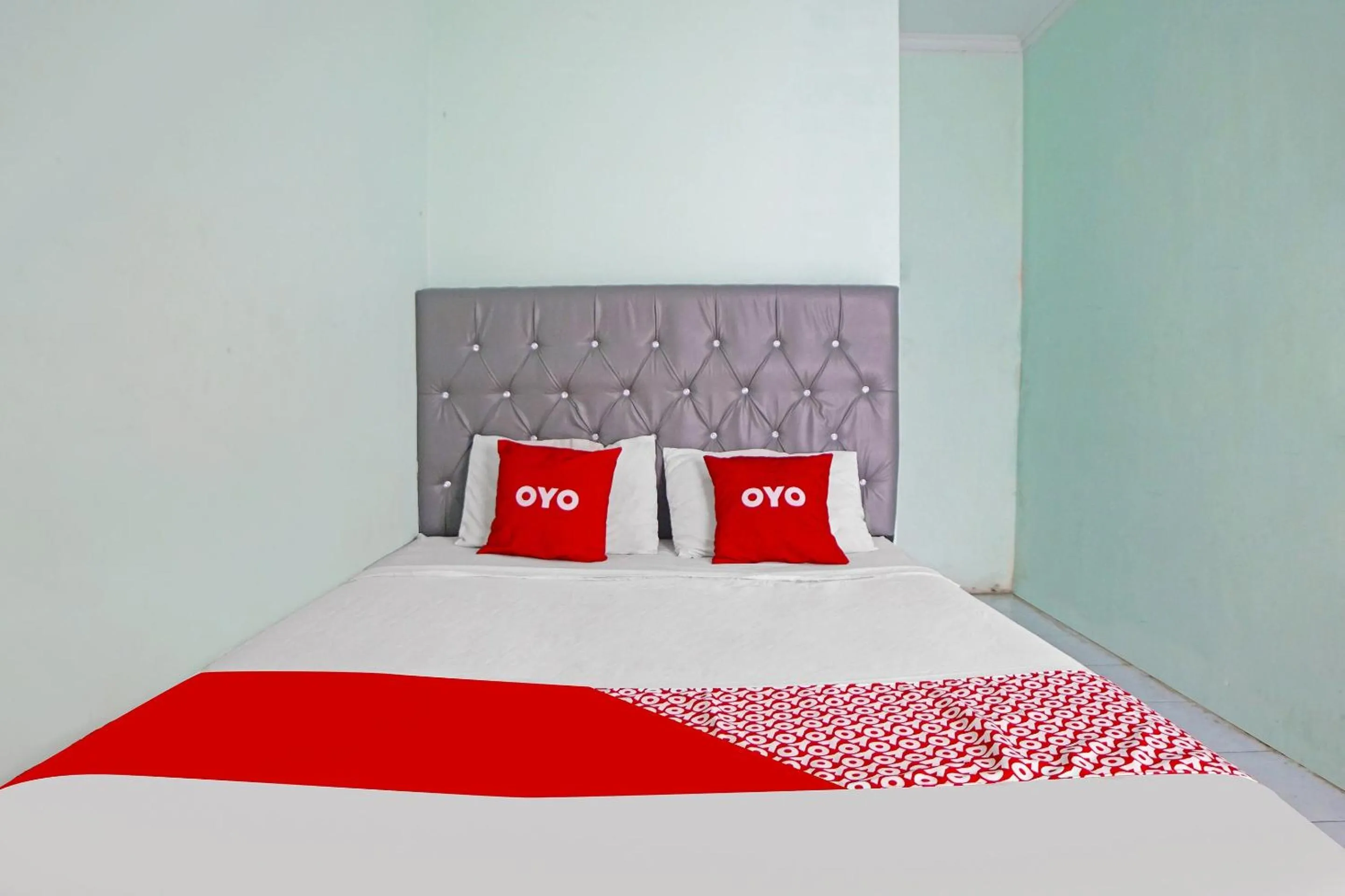 Bedroom in Hotel O Puri Dennis