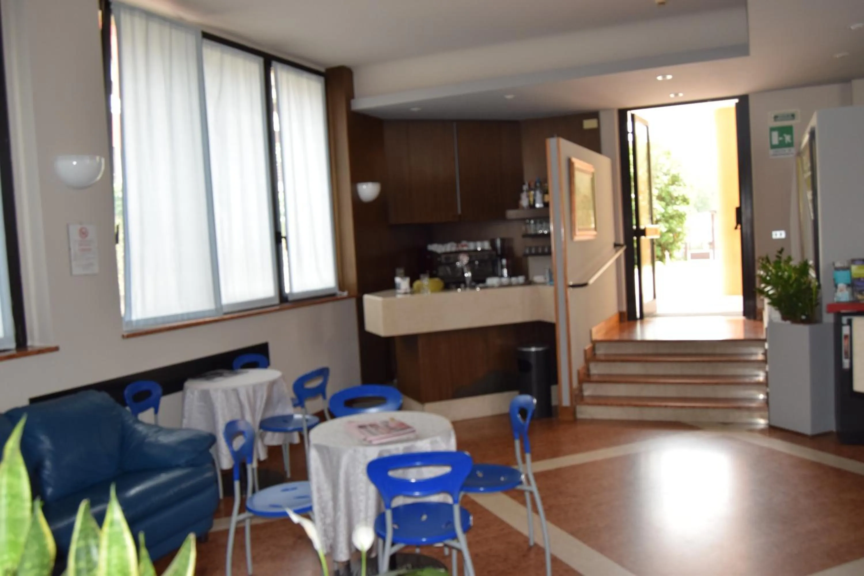 Communal lounge/ TV room in Hotel Roma