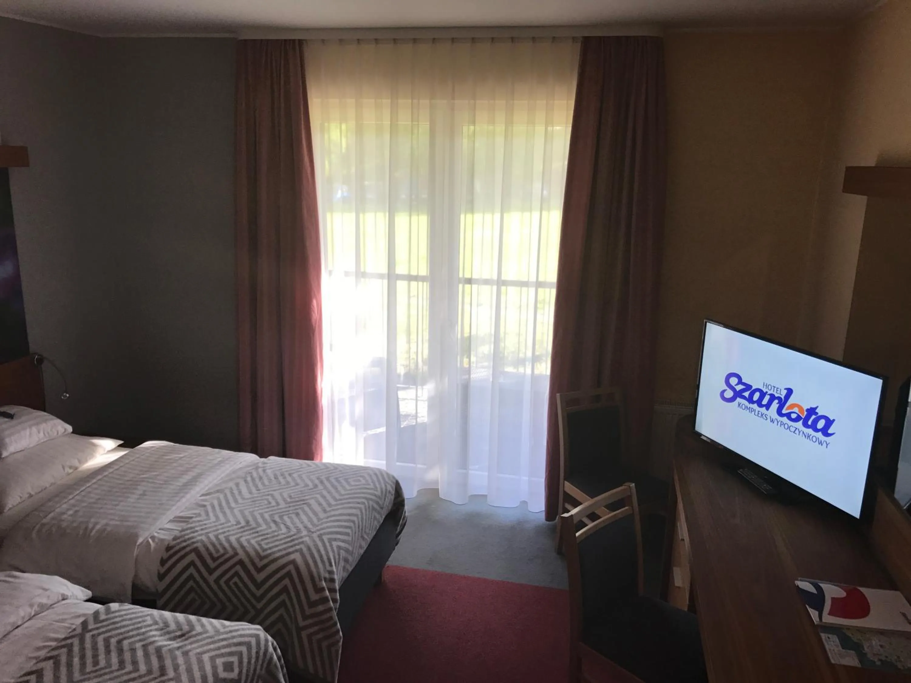 Bed in Hotel Szarlota - Kompleksowo na Kaszubach