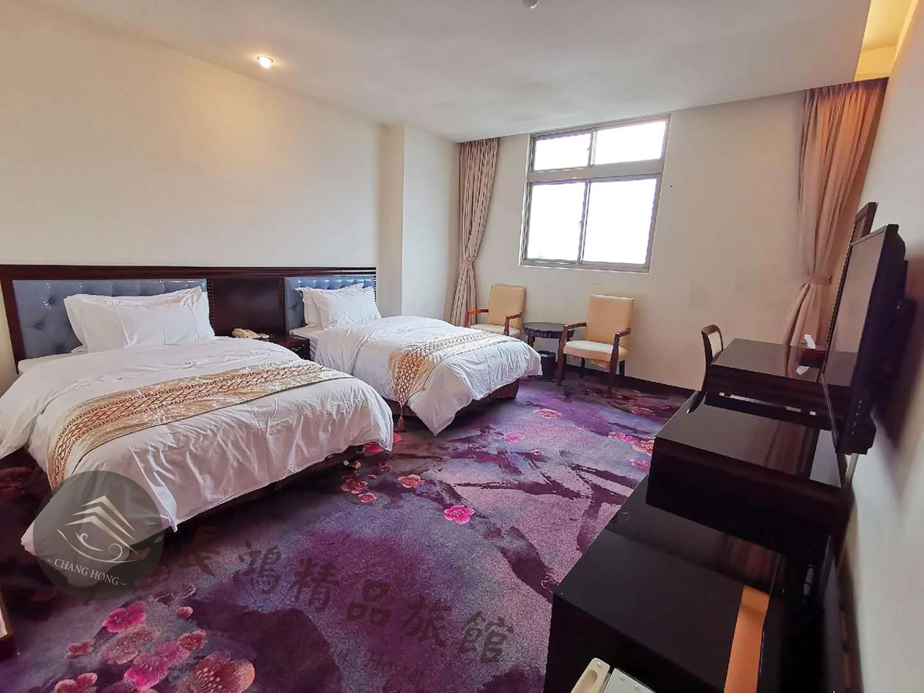 Bed in Chang Hong Hotel