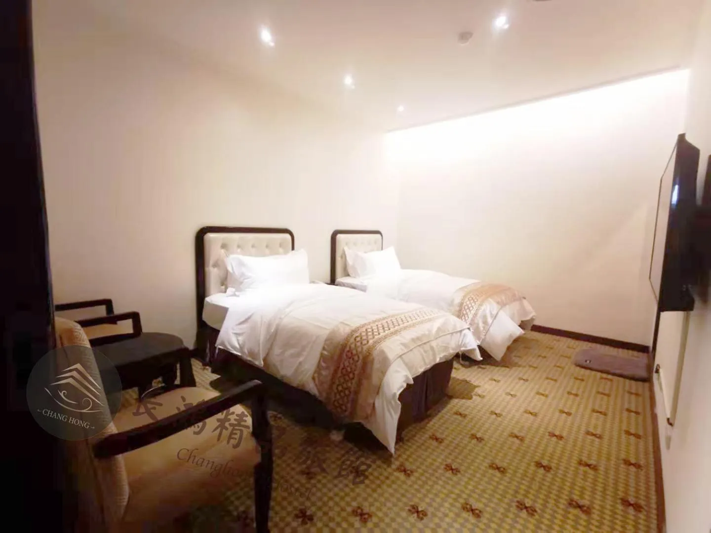 Bed in Chang Hong Hotel