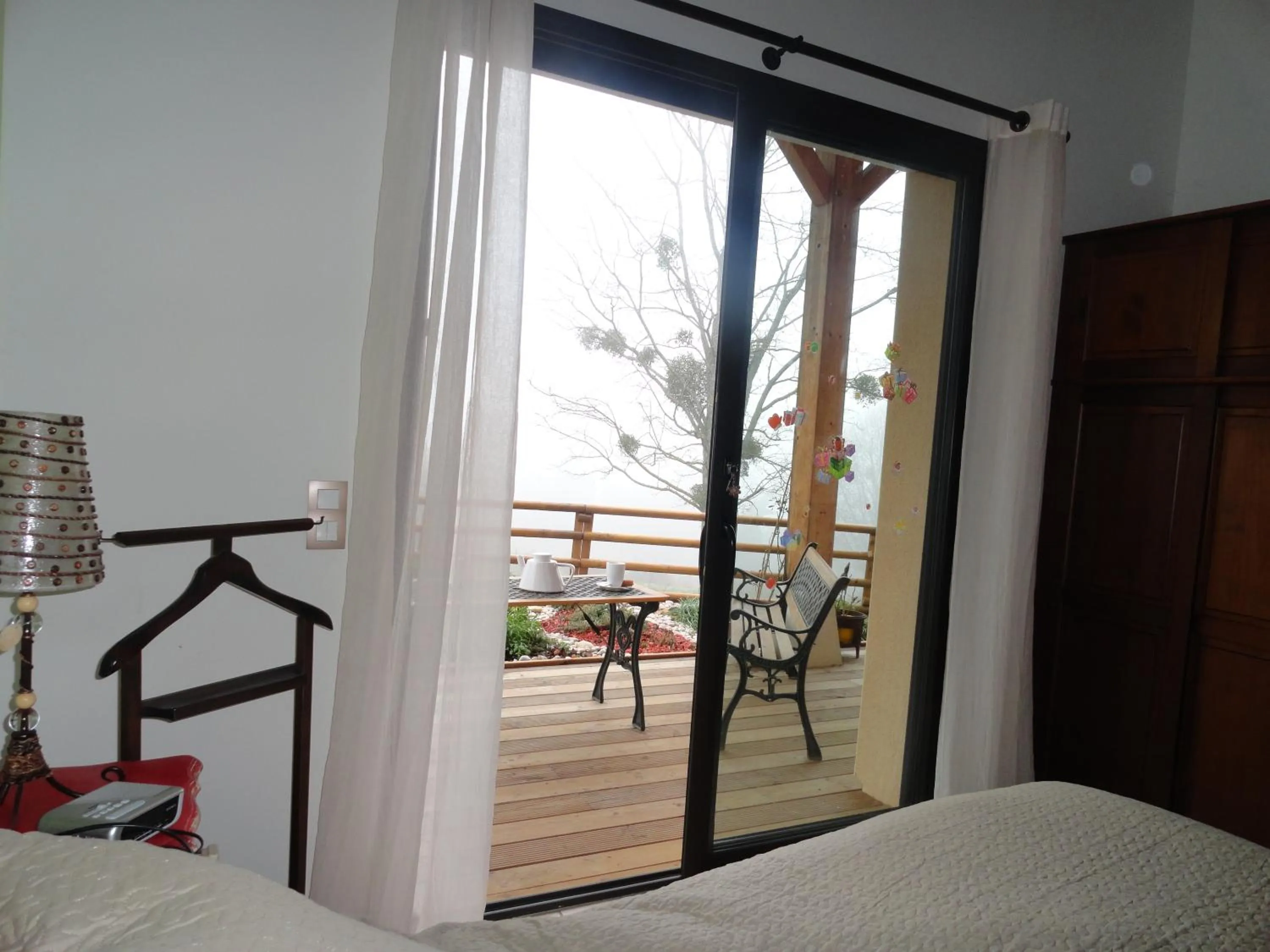 View (from property/room), Bed in Le Grand Noyer