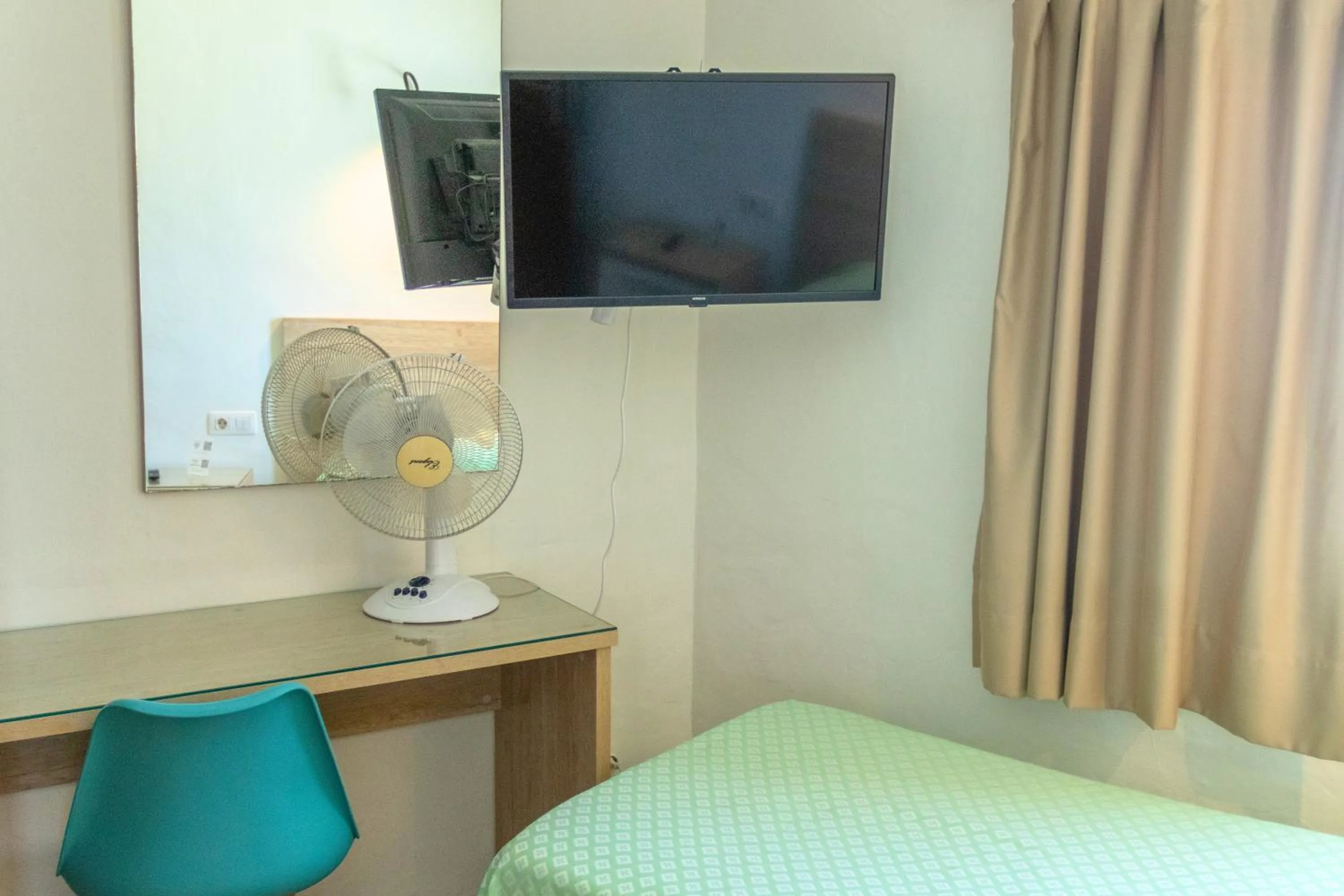 TV and multimedia, Bed in Hostal Magec