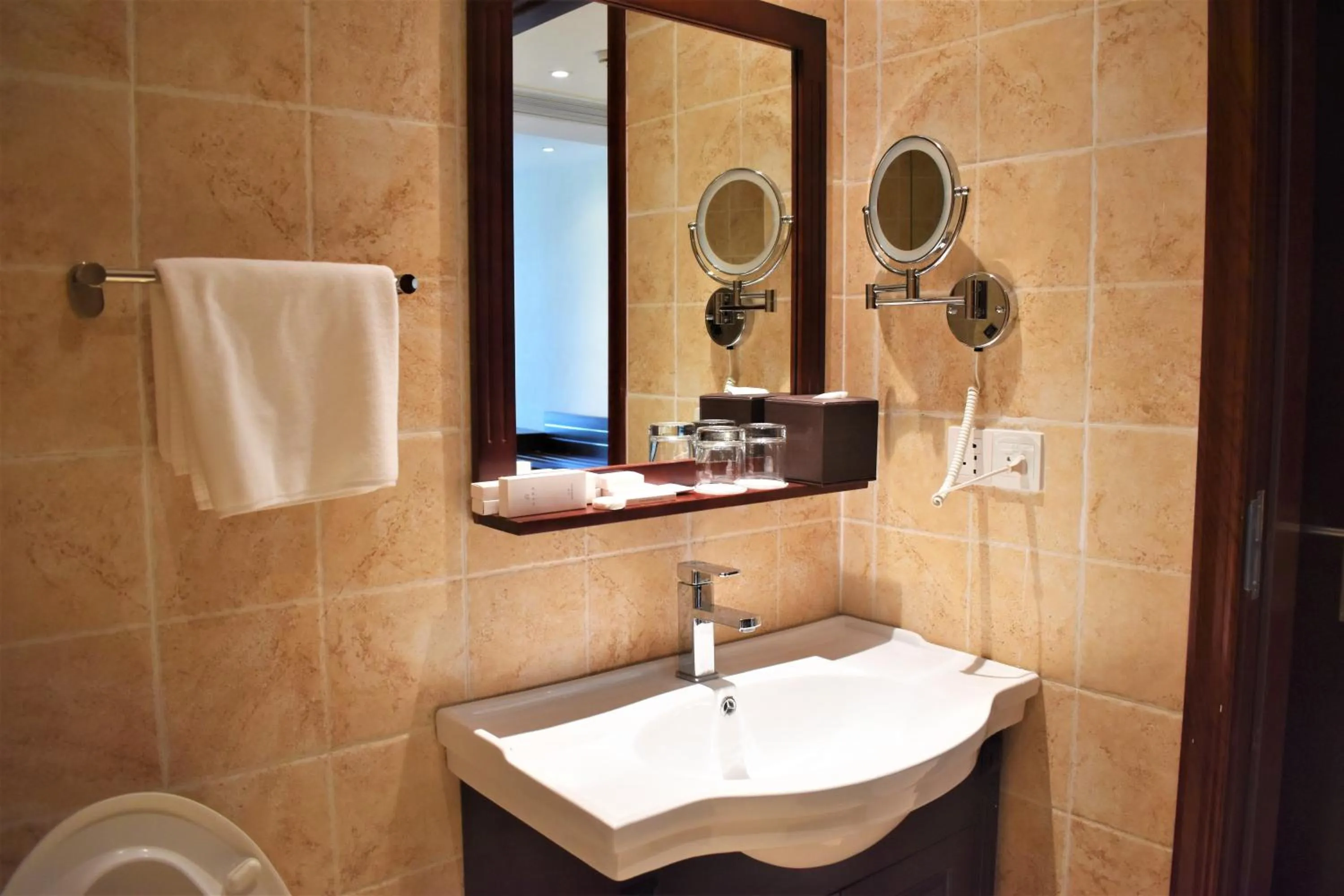 Bathroom in Olympia City Hotel by Dara