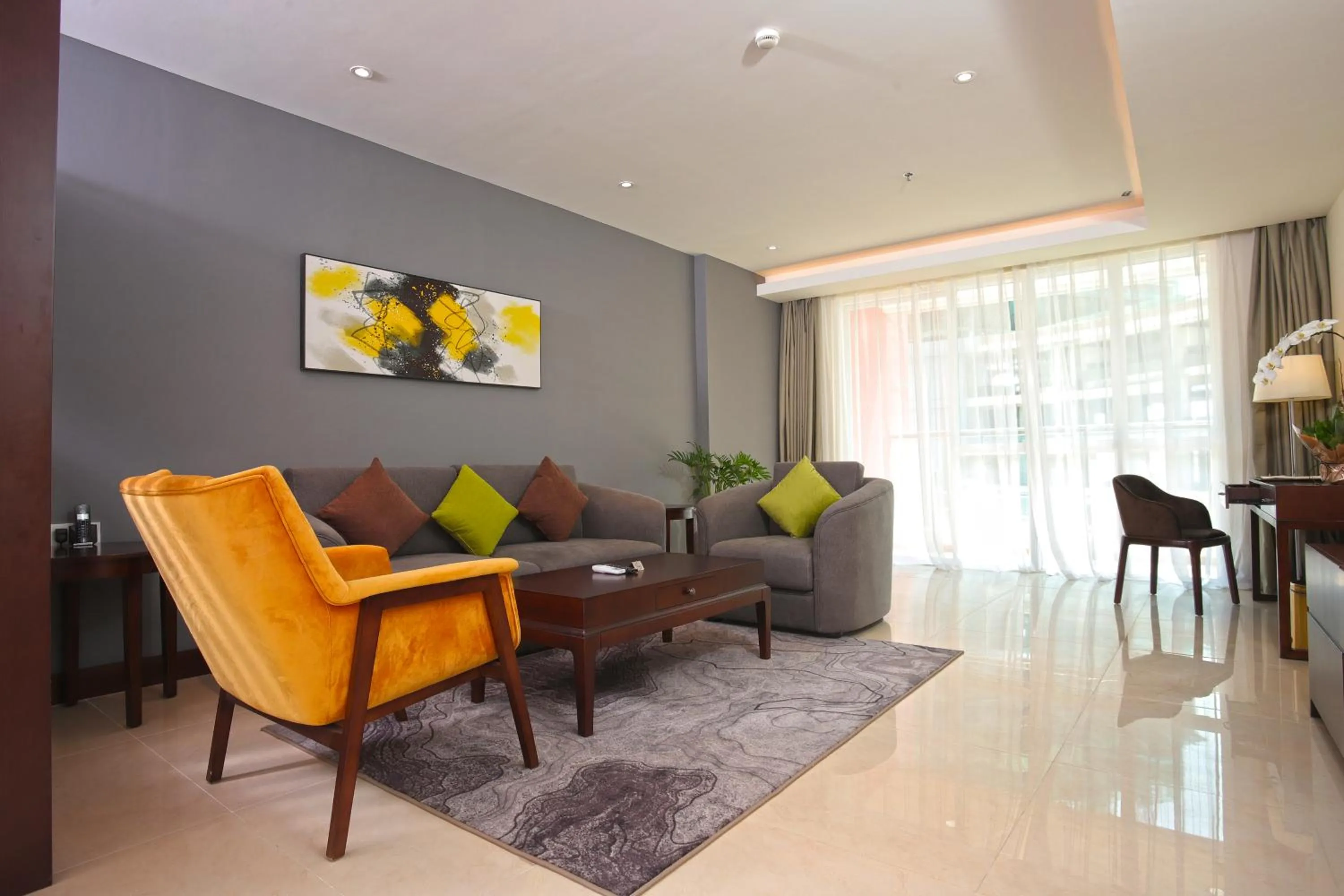 Living room in Olympia City Hotel by Dara