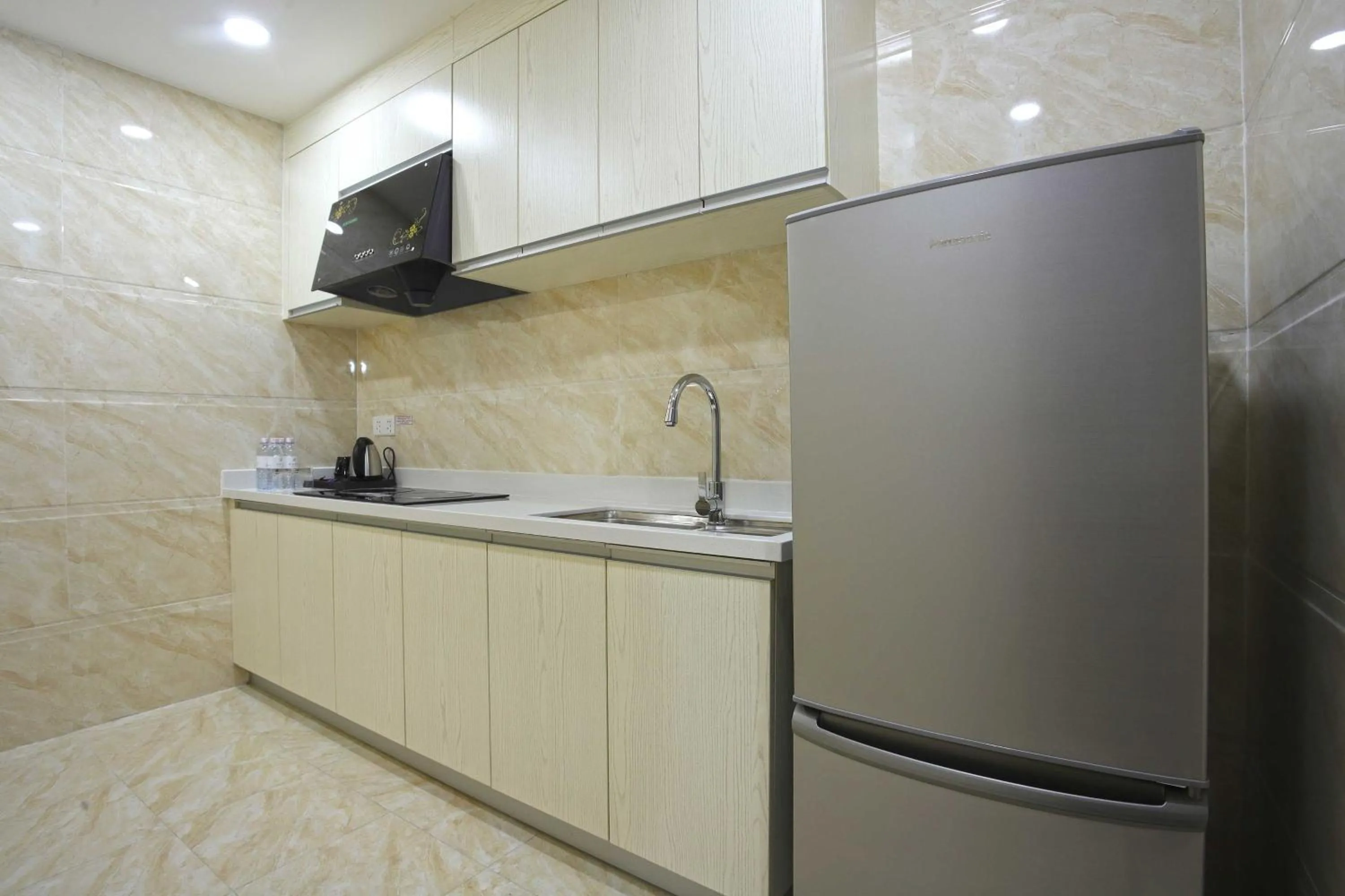 kitchen in Olympia City Hotel by Dara