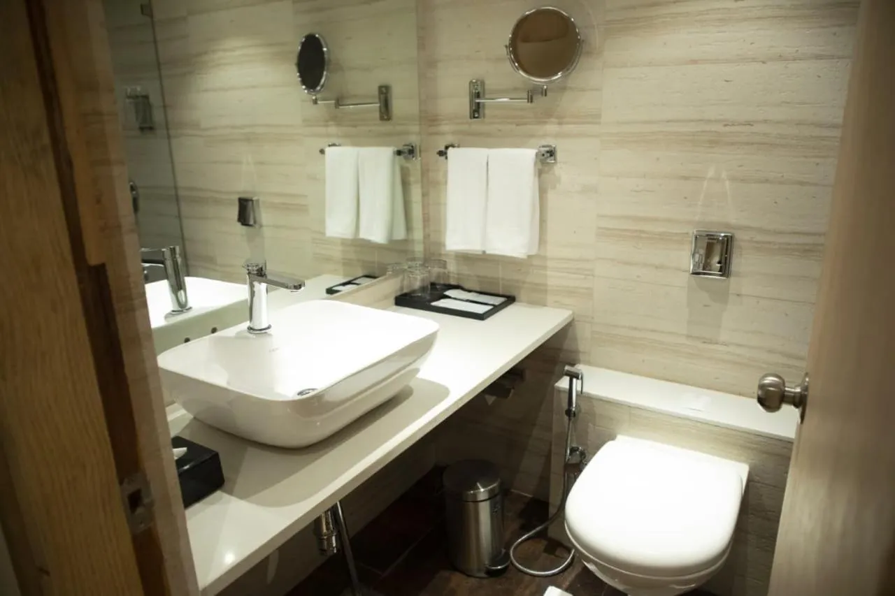 Bathroom in Regenta Central Harsha Vapi