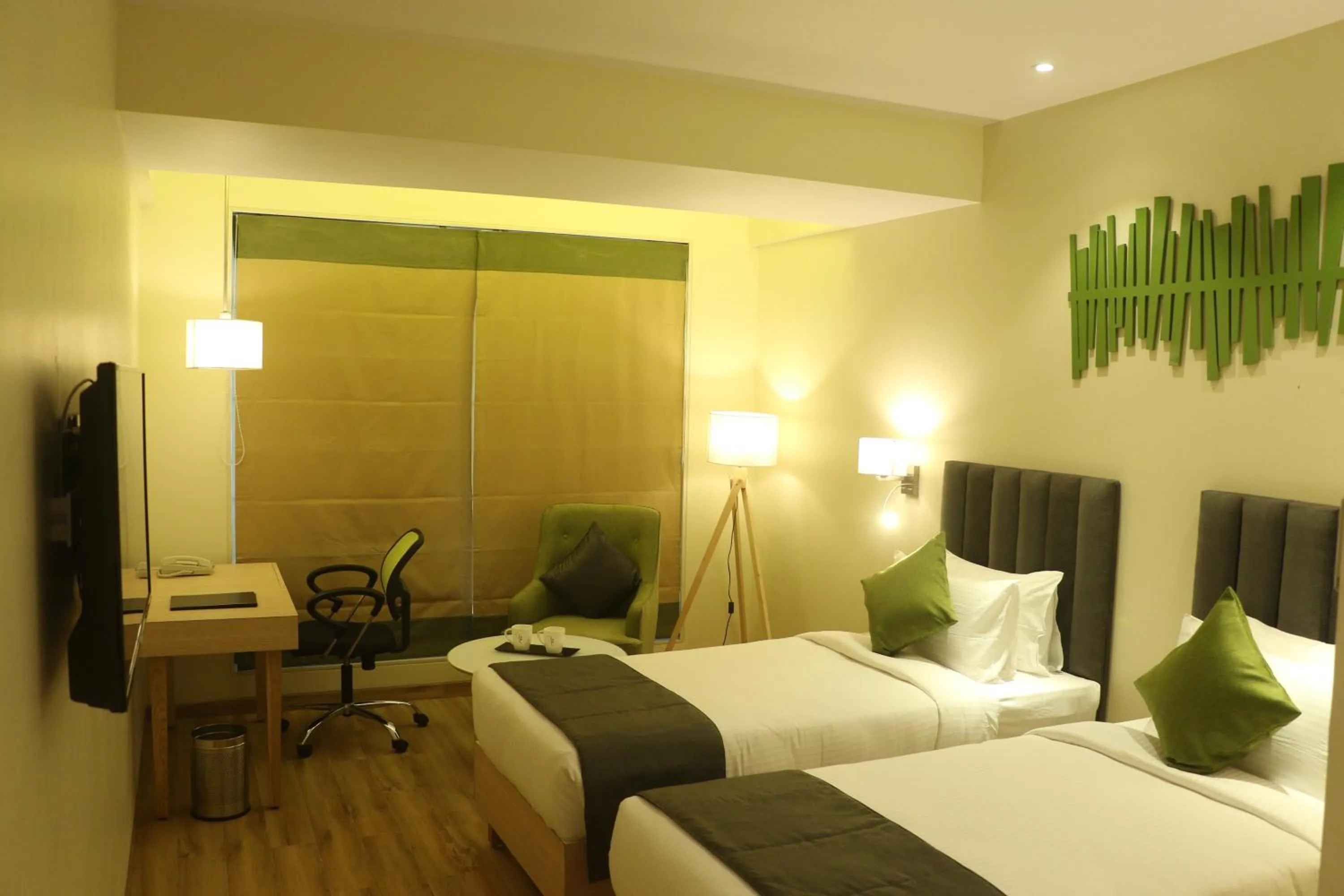 Bedroom in Regenta Central Harsha Vapi