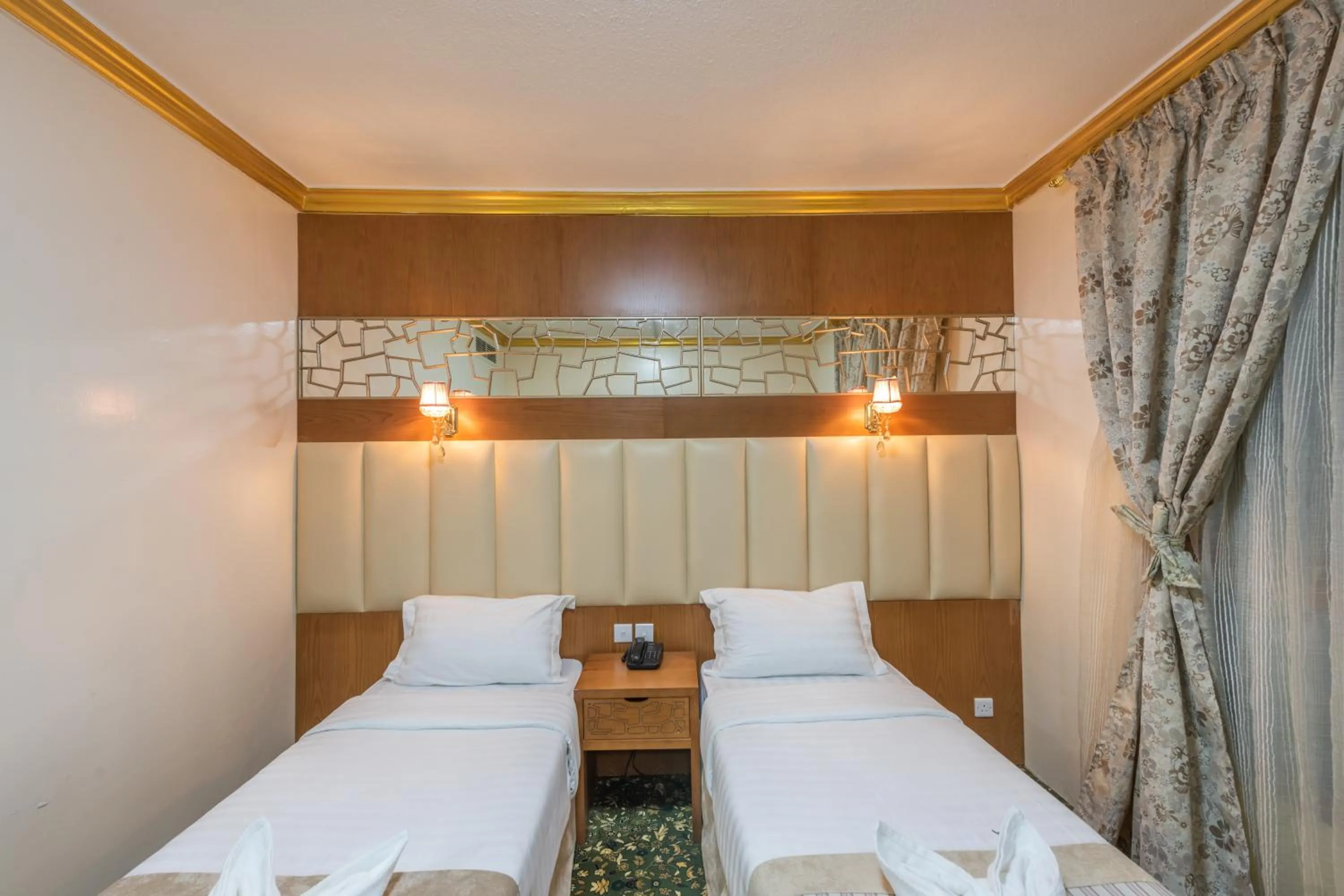 Bed in Grand Zowar Hotel