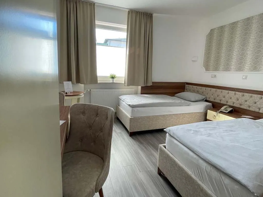 Bed in Hotel Rosenheim