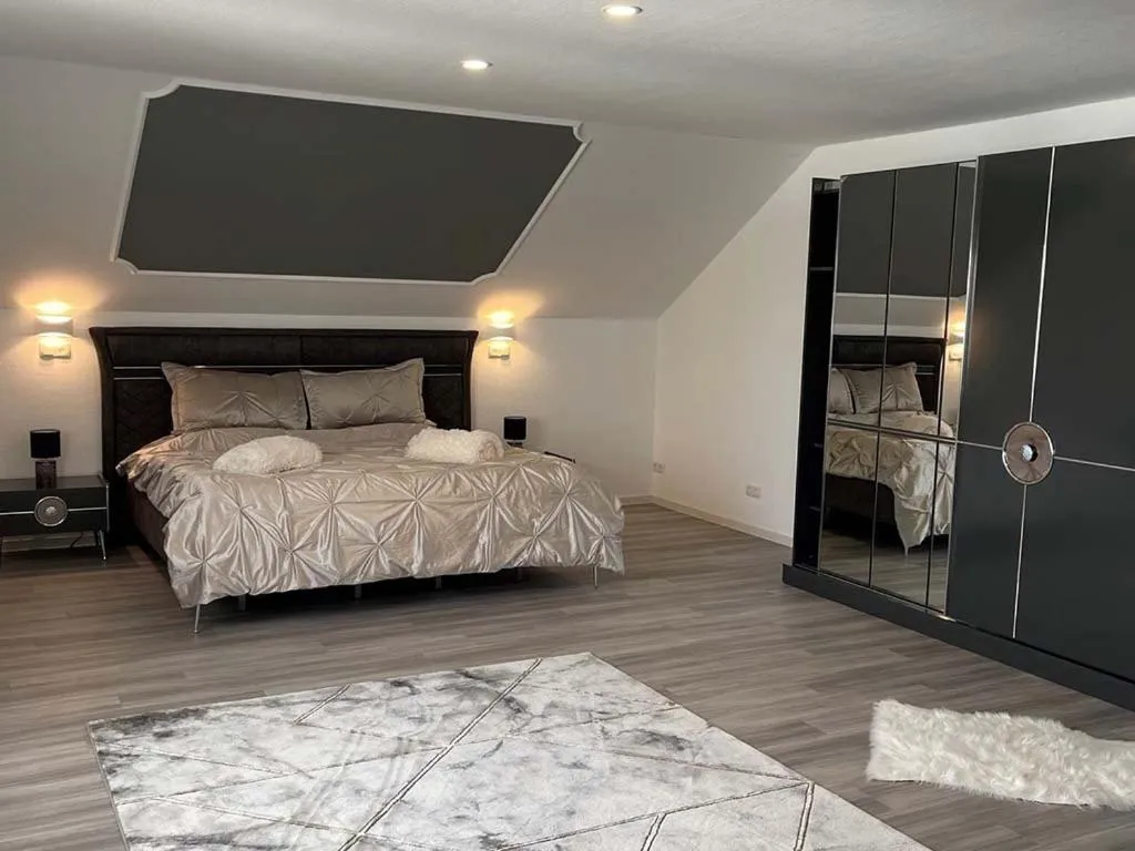 Bed in Hotel Rosenheim