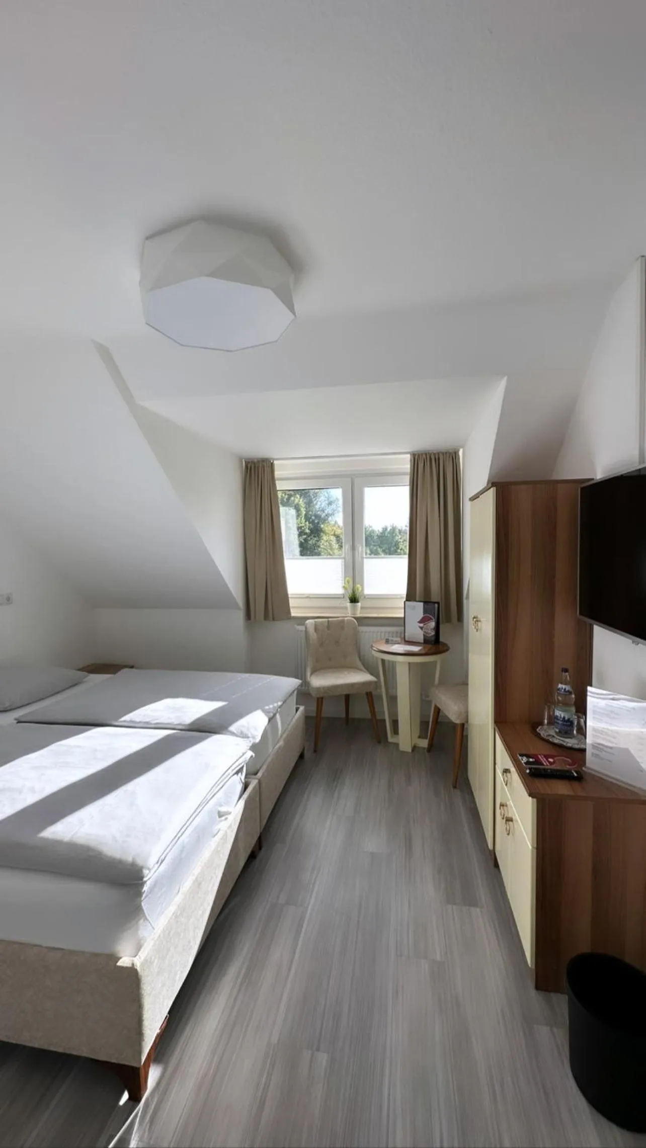 Bed in Hotel Rosenheim