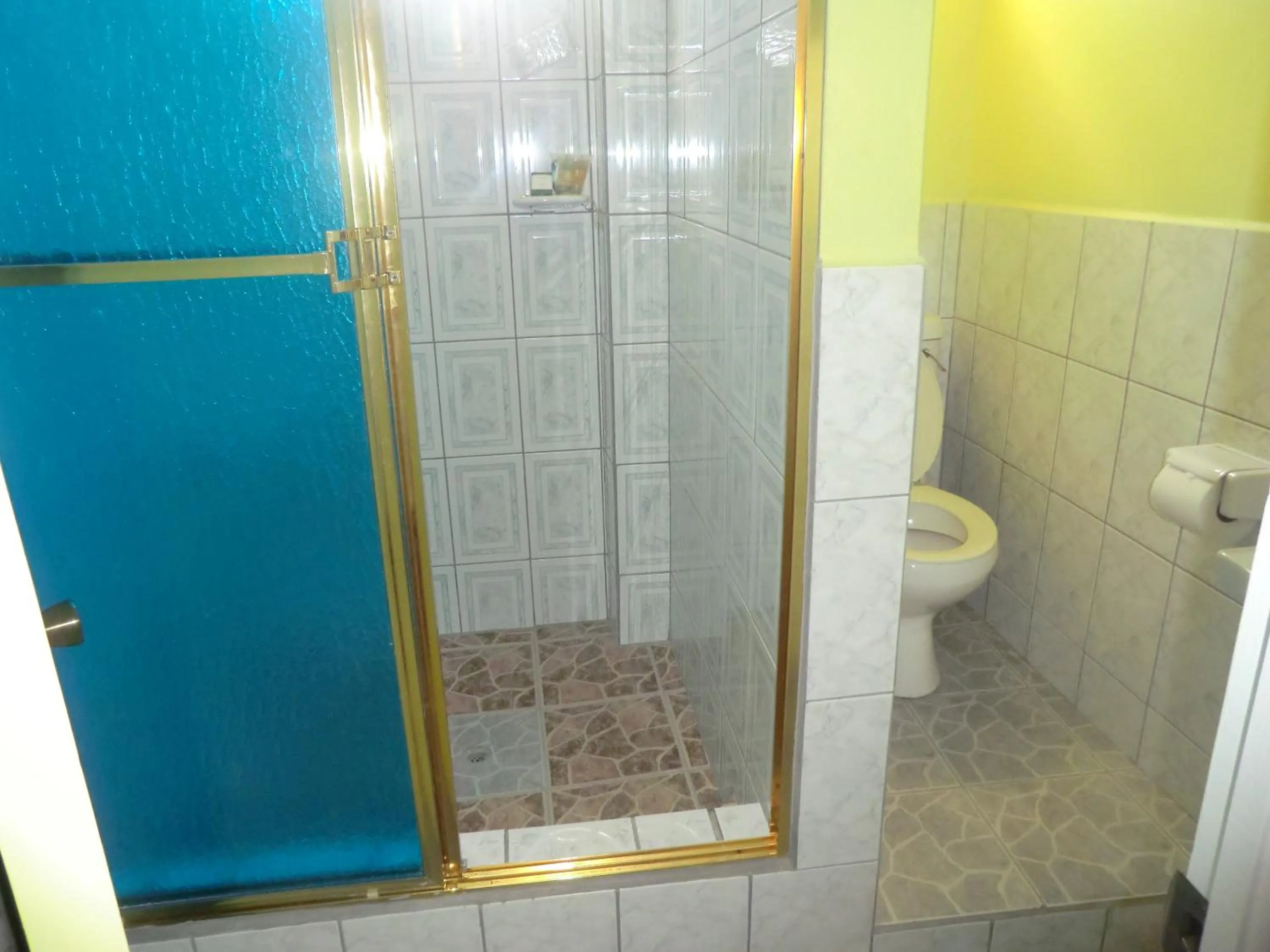 Bathroom in PG Quality Inn