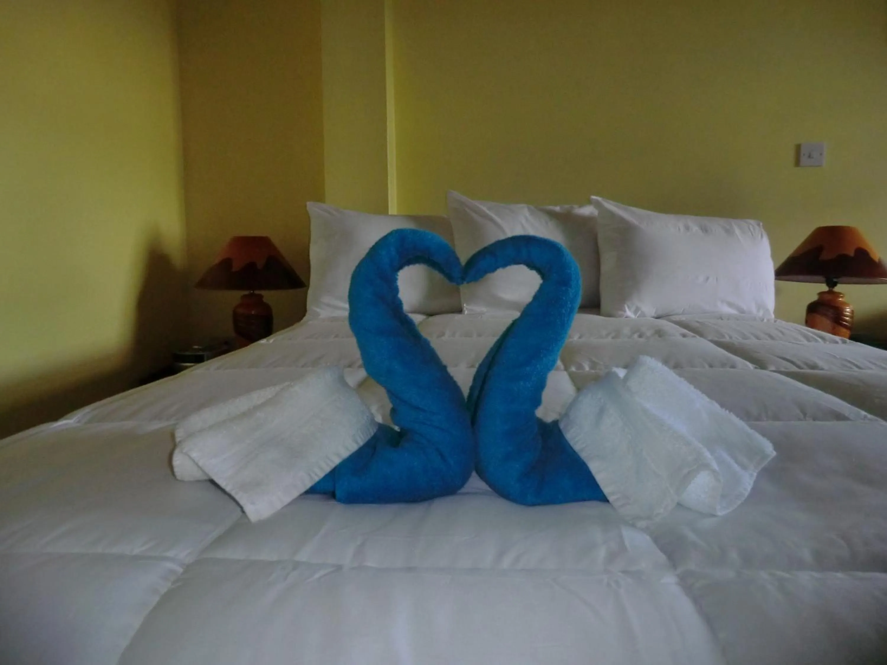 Bed in PG Quality Inn