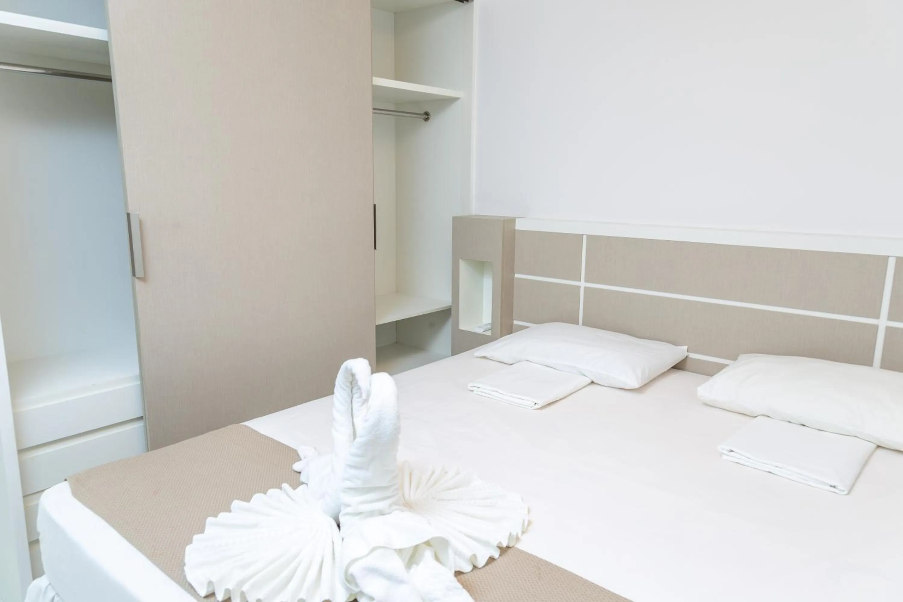 Bed in Golf Ville Resorts Suites