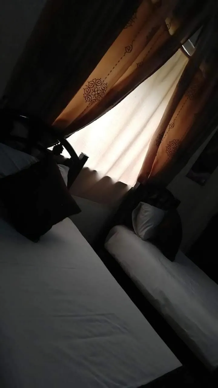 Bedroom in Caravan Hotel