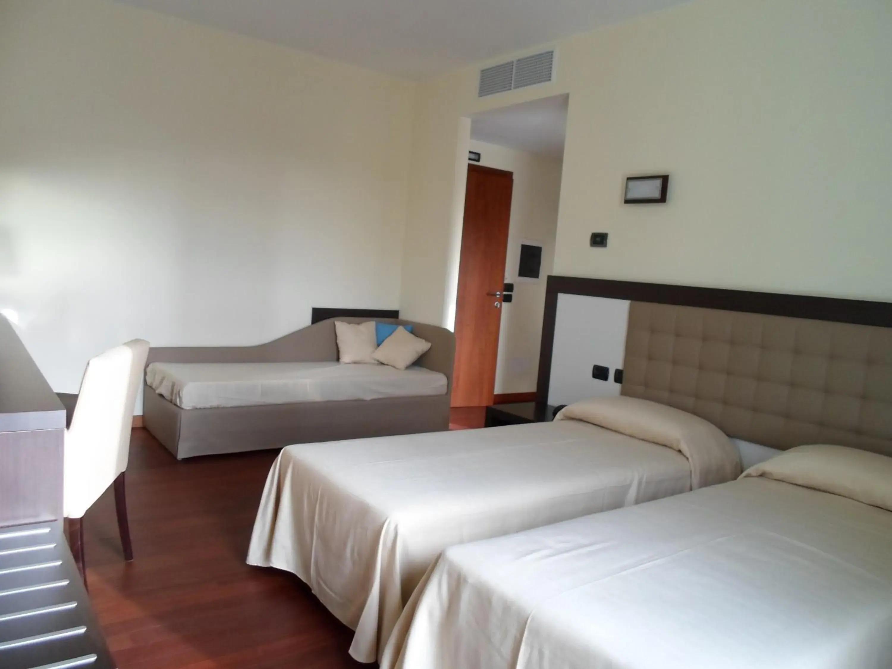 Superior Triple Room in Hotel Le Macine Superior Triple Room in Hotel Le Macine