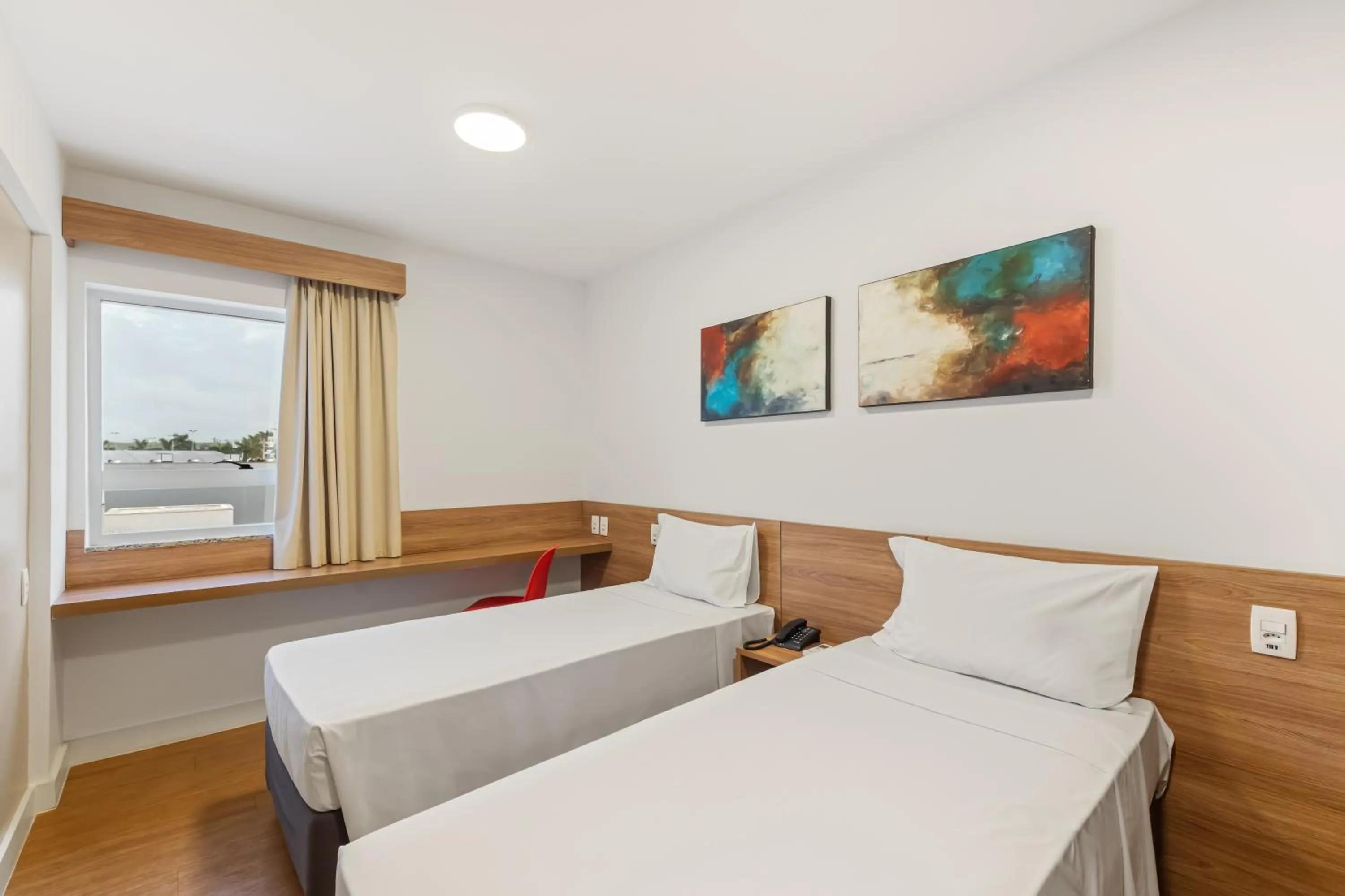 Bed in Blue Tree Towers Jaguariúna