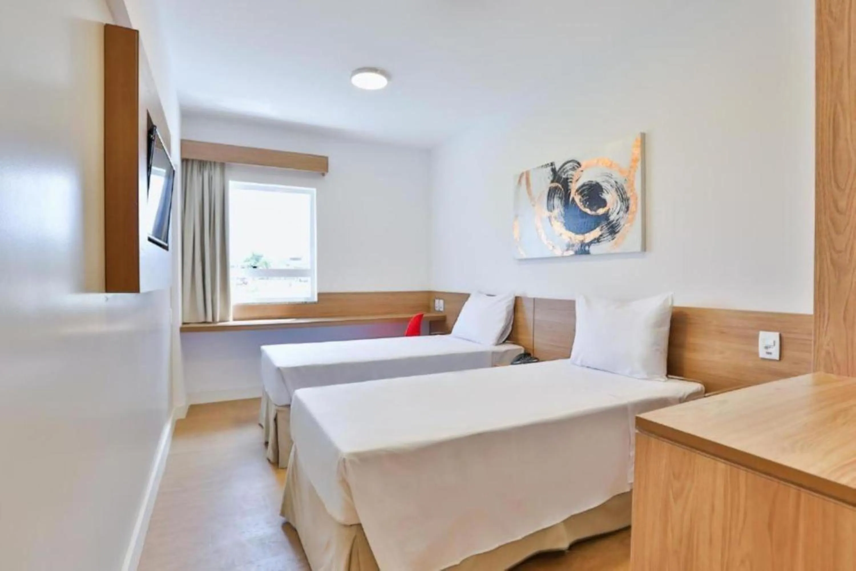 Bed in Blue Tree Towers Jaguariúna