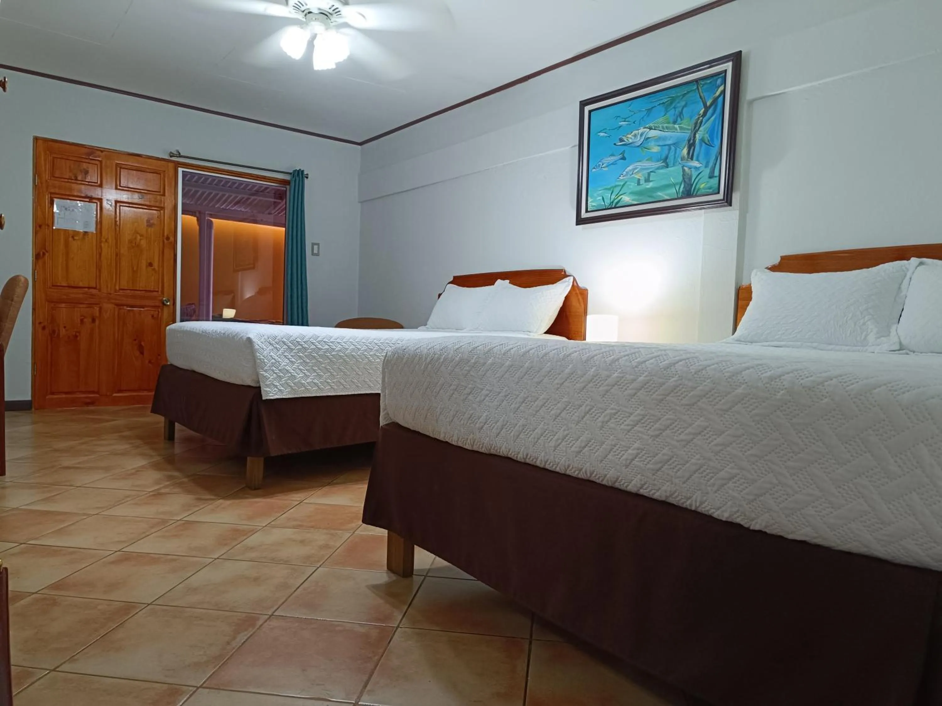 Photo of the whole room, Bed in Banana Bay Marina