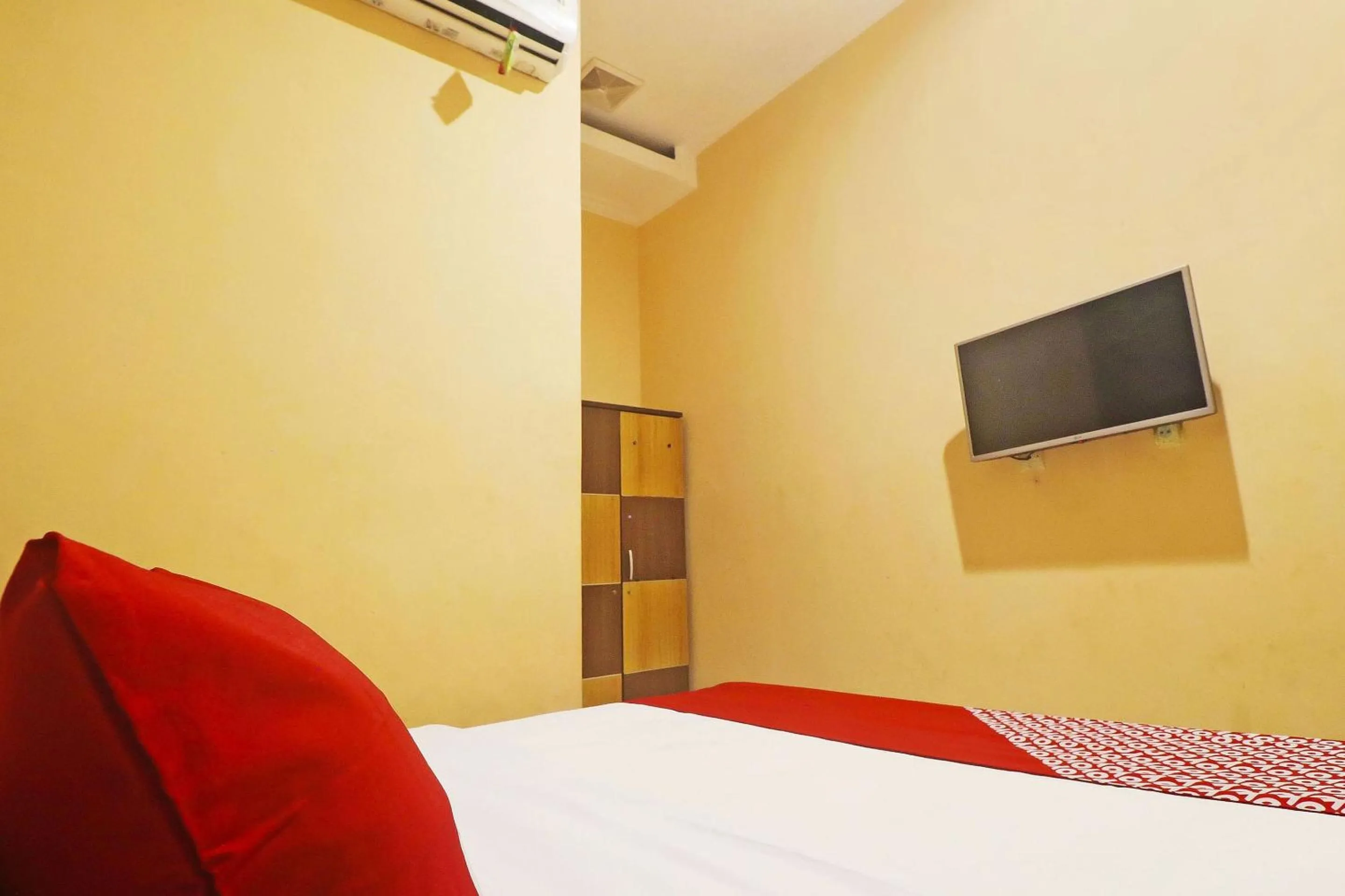 Bedroom in Hotel O Papi Inn Guesthouse