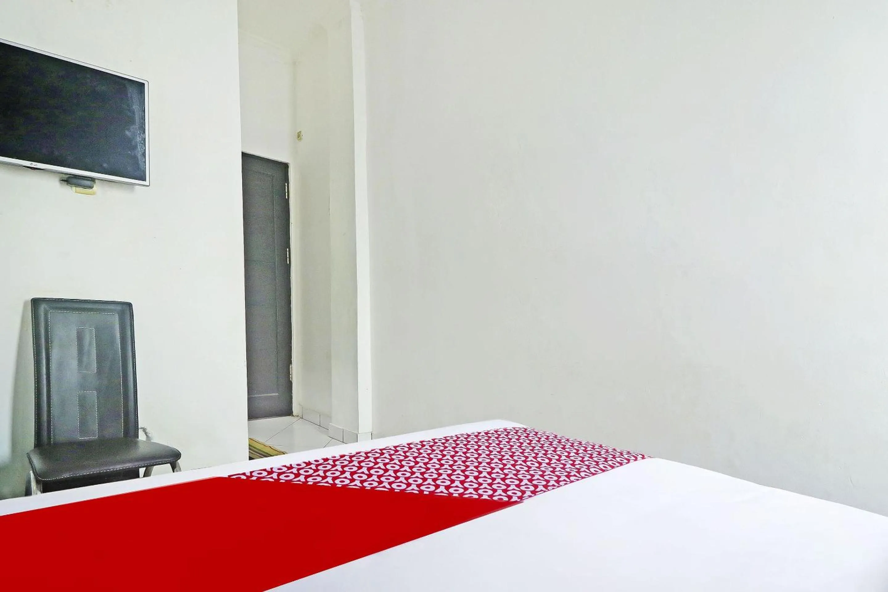 Bedroom in Hotel O Papi Inn Guesthouse