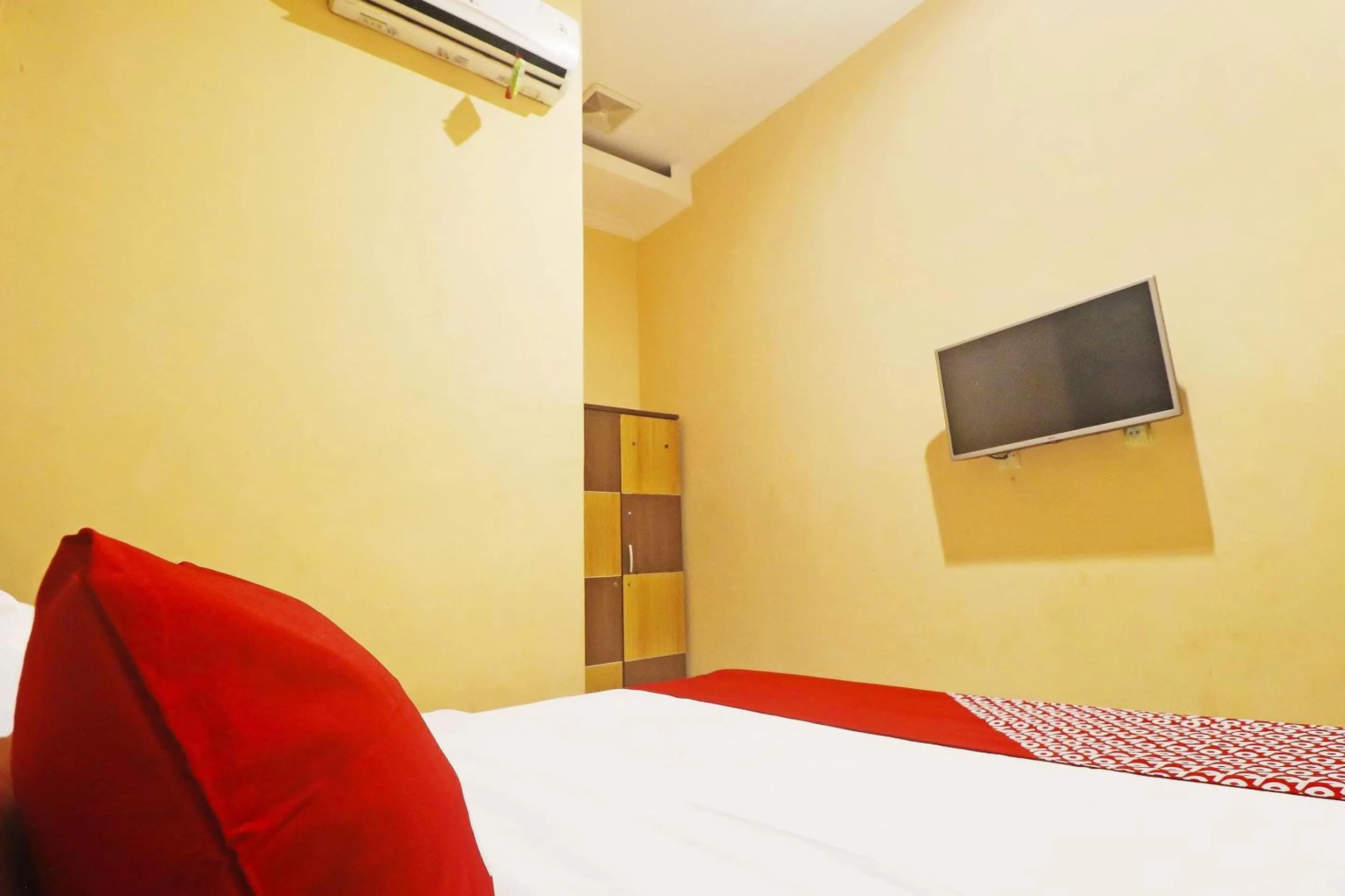 Bedroom in Hotel O Papi Inn Guesthouse