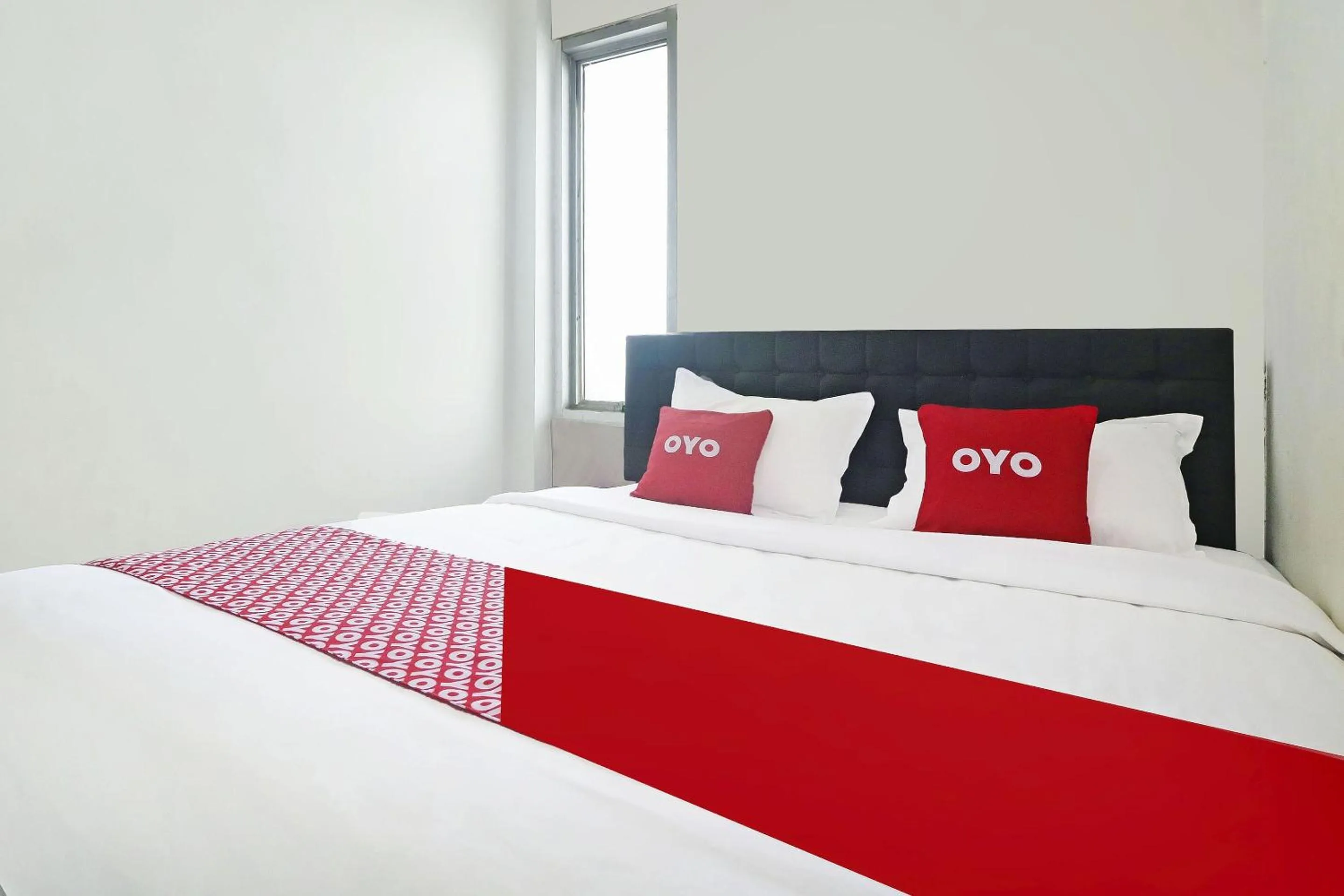 Bedroom in Hotel O Papi Inn Guesthouse