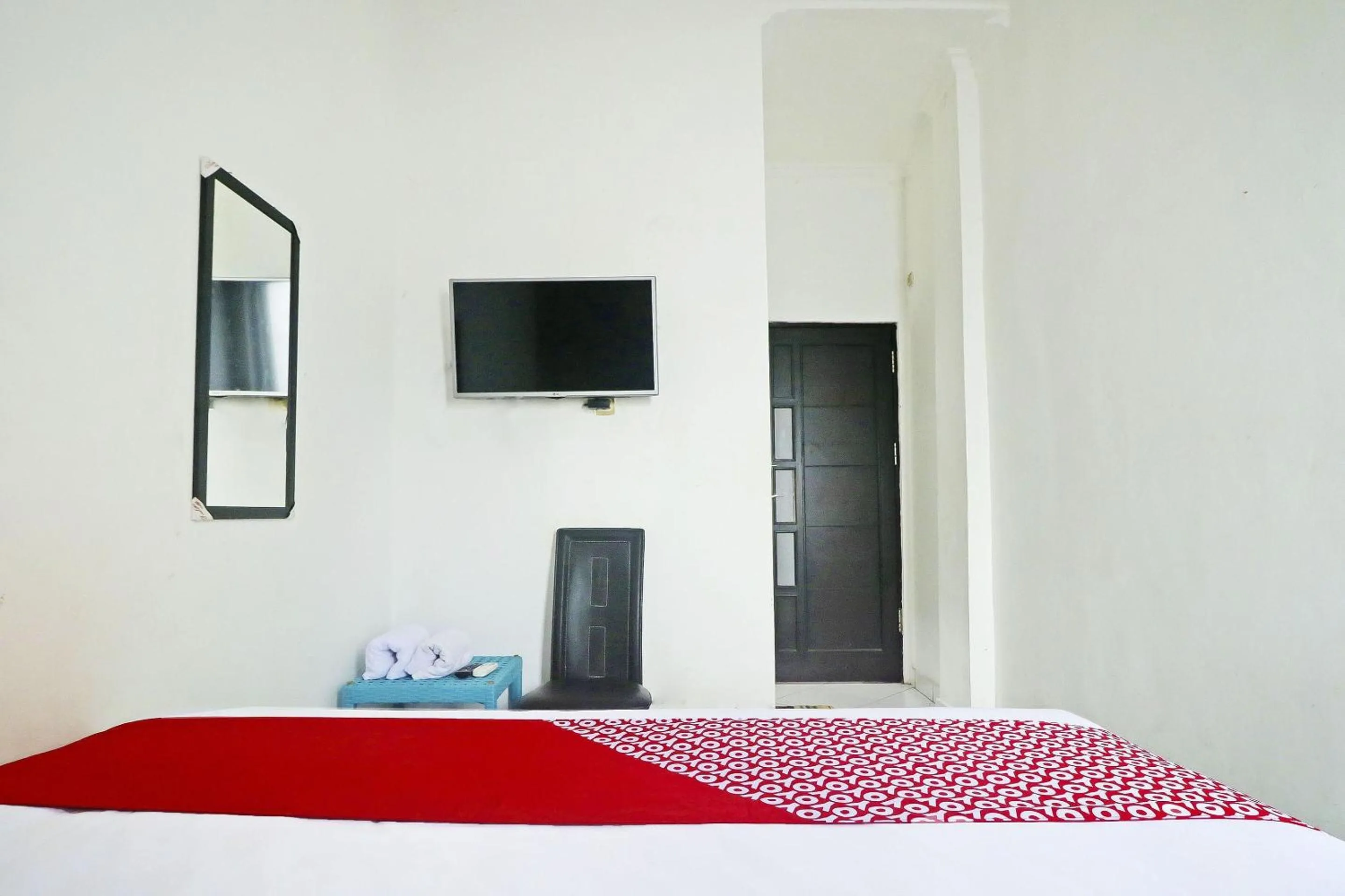 Bedroom in Hotel O Papi Inn Guesthouse