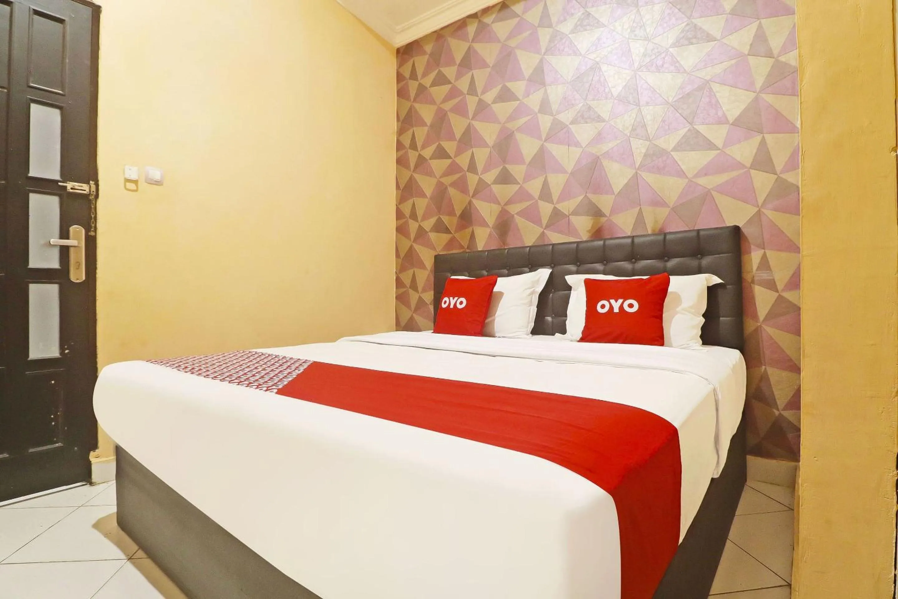 Bedroom in Hotel O Papi Inn Guesthouse