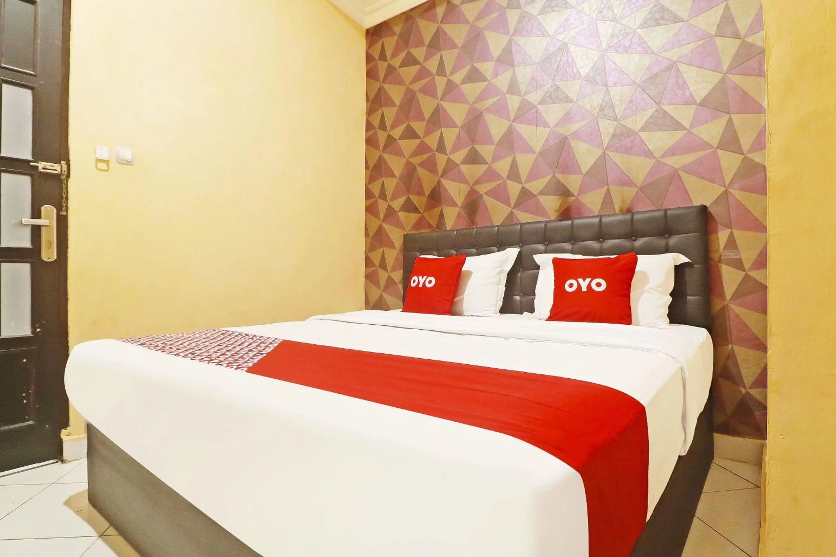 Bedroom in Hotel O Papi Inn Guesthouse