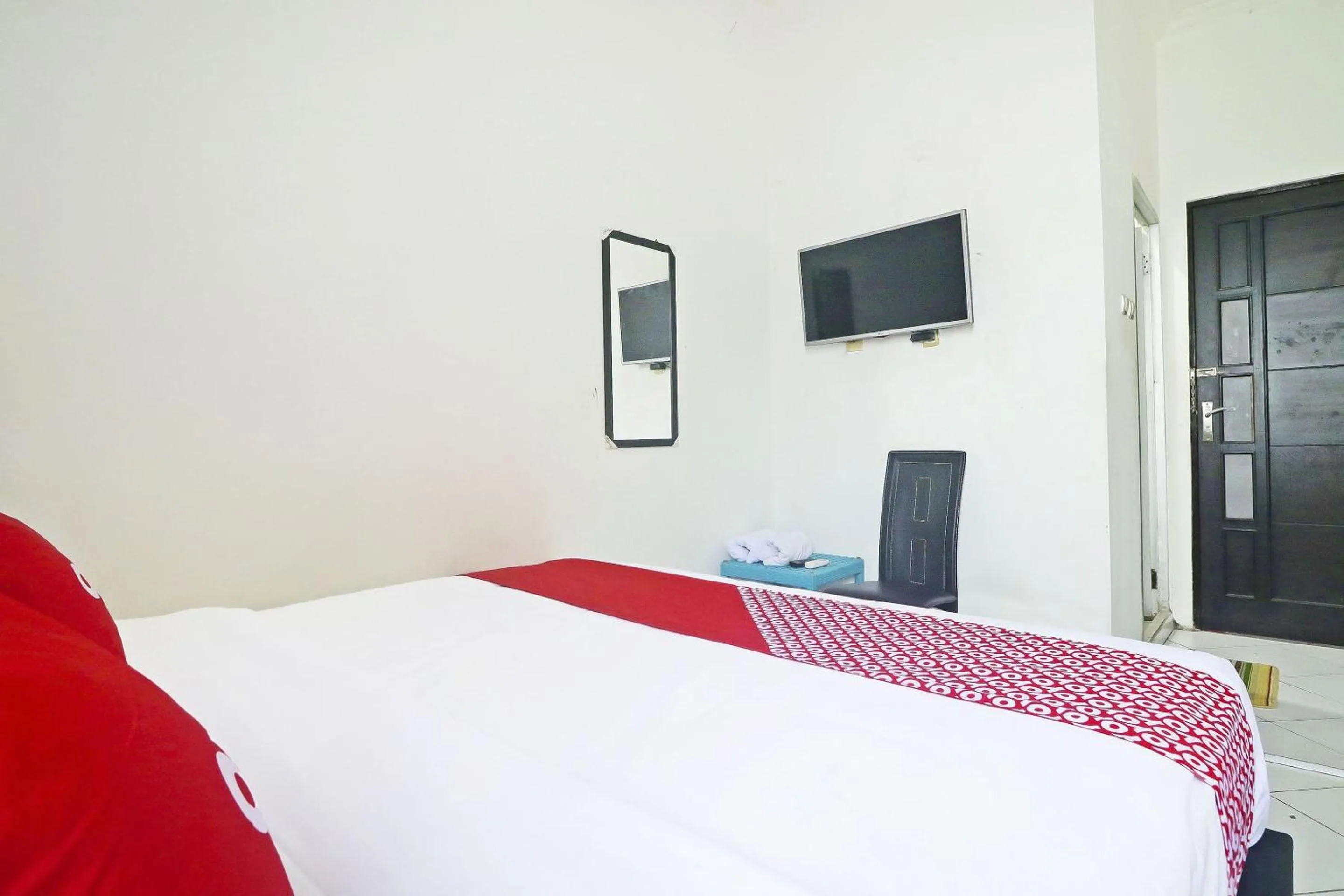 Bedroom in Hotel O Papi Inn Guesthouse